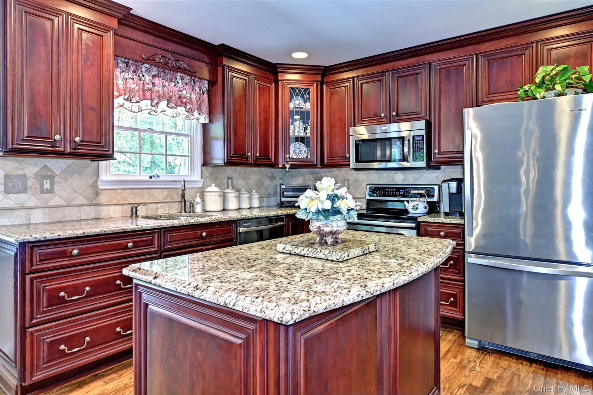 Granite Countertops and Island that's Great for Meal Prep Granite Countertops and Island that's Great for Meal Prep