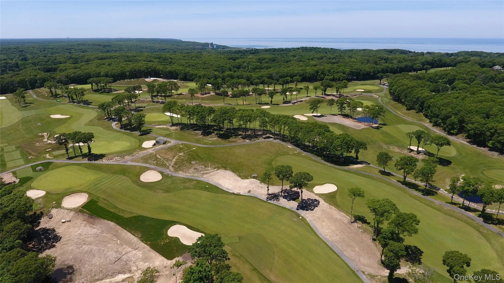 Aerial View of Golf Course behind the House Aerial View of Golf Course behind the House
