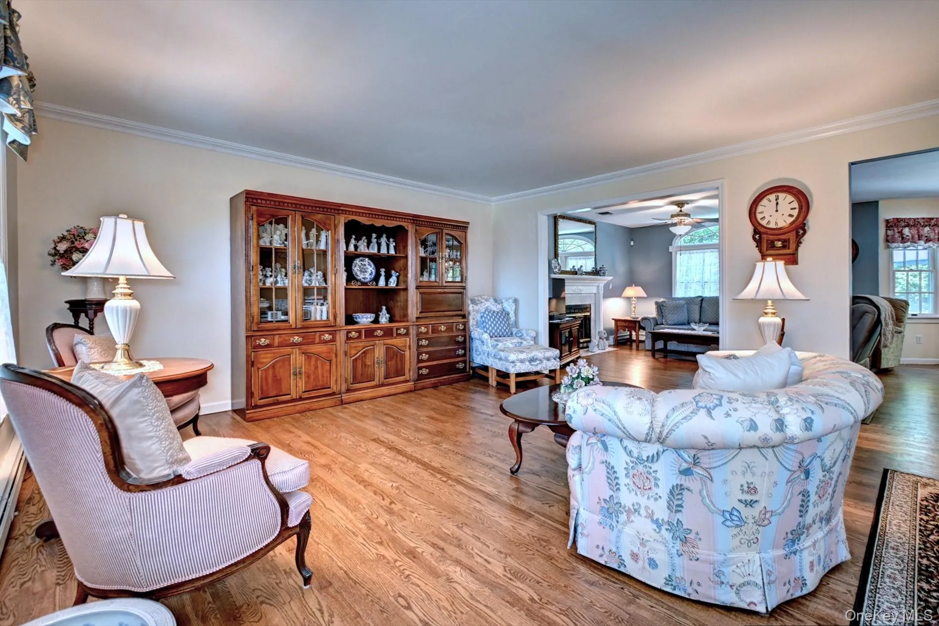 The Living Room is open to the Den & Dining Room The Living Room is open to the Den & Dining Room