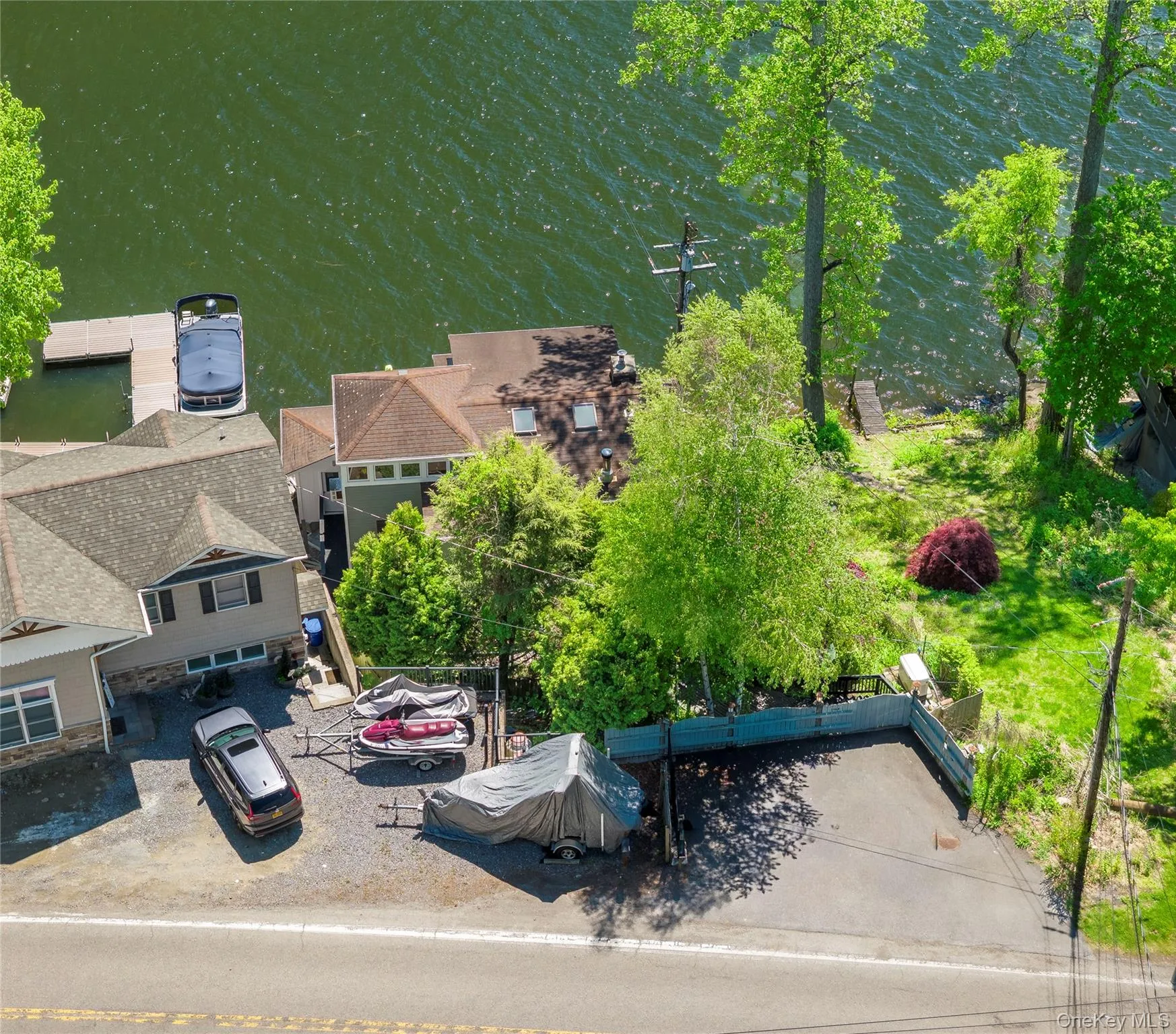 Aerial from back of house with parking area in the near ground. Aerial from back of house with parking area in the near ground.
