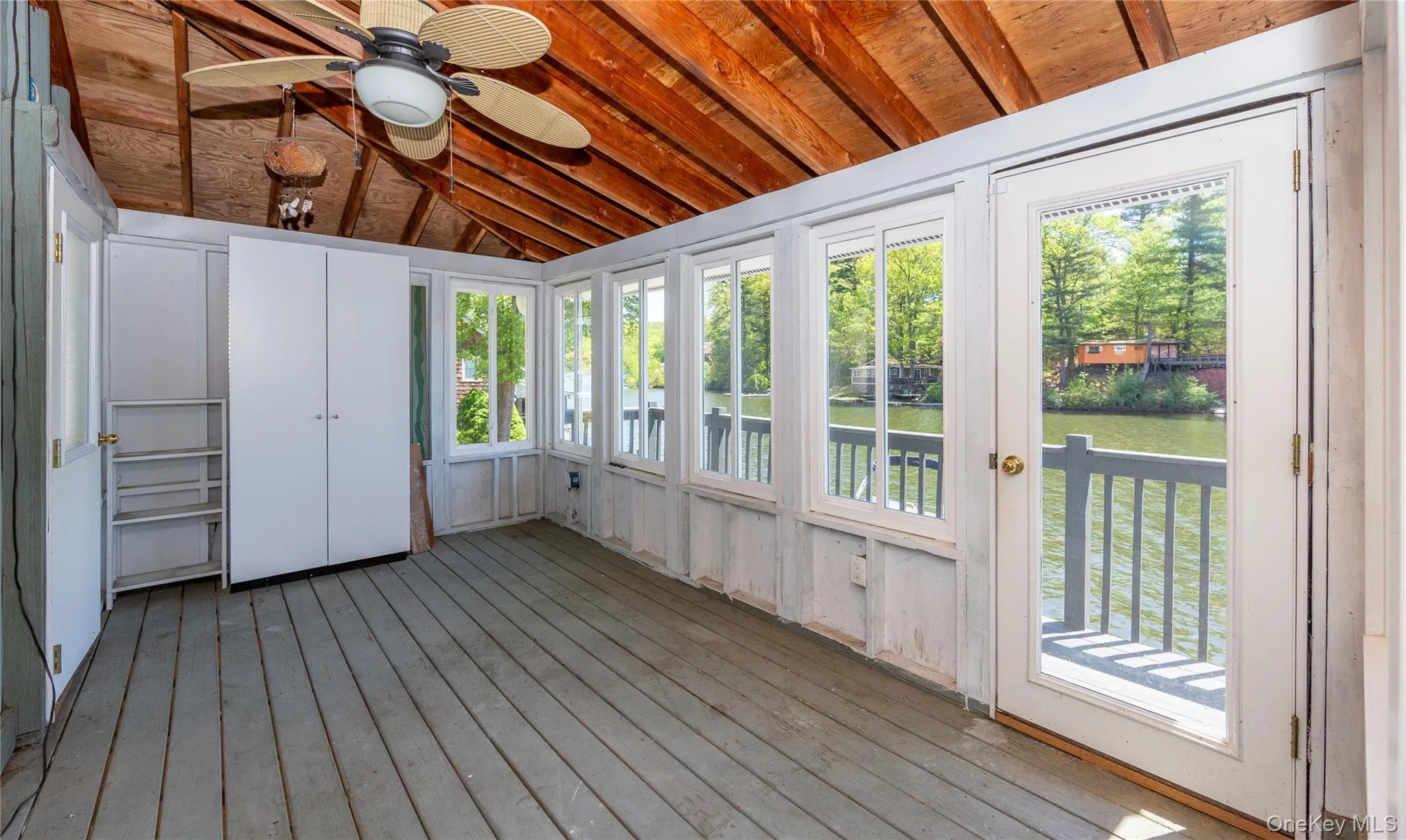 Porch / sunroom with windows. Porch / sunroom with windows.