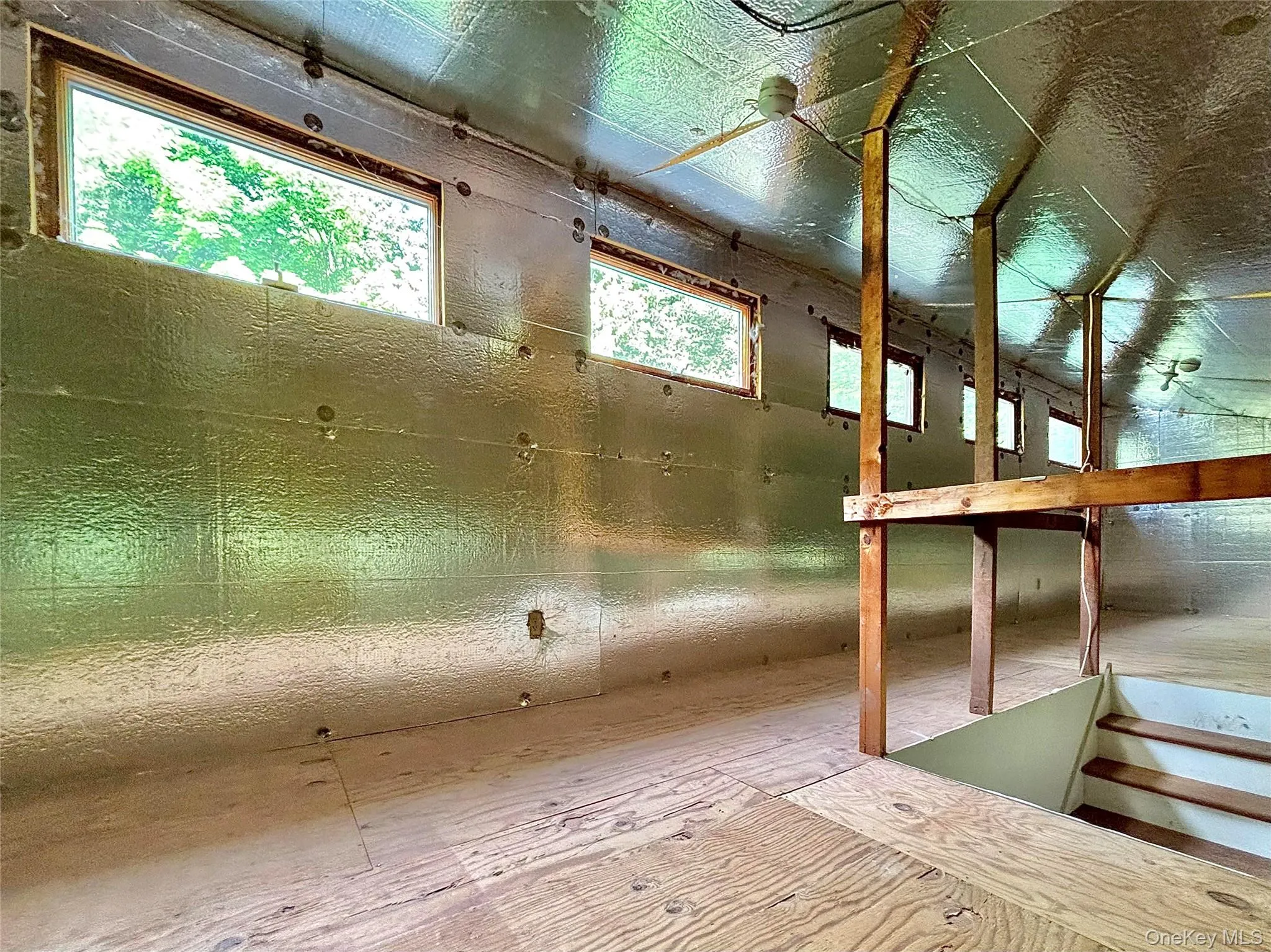 Attic space ready to finish 5 windows, insulated walls and finished staircase Attic space ready to finish 5 windows, insulated walls and finished staircase