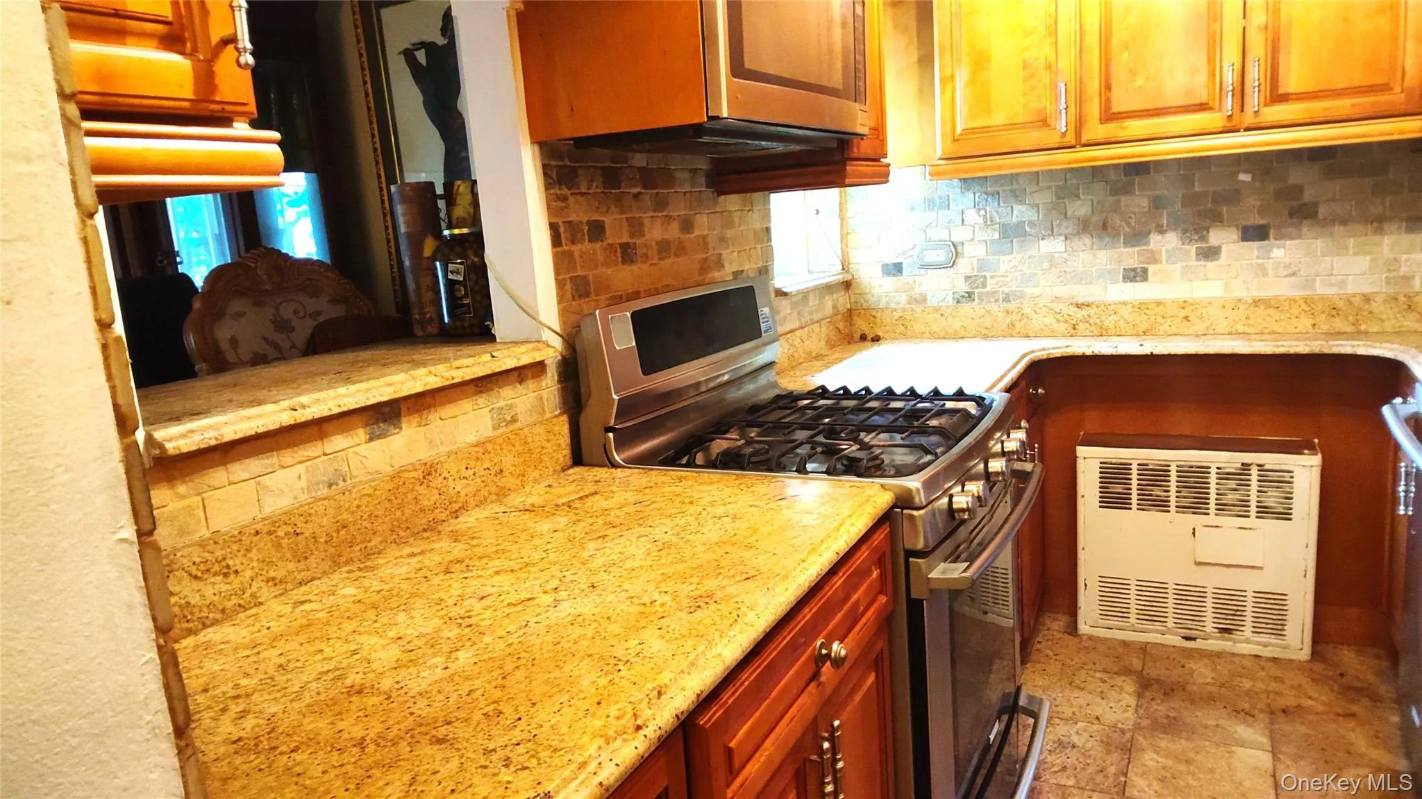 Lots of counter space and pass through window to counter height eating area. Lots of counter space and pass through window to counter height eating area.