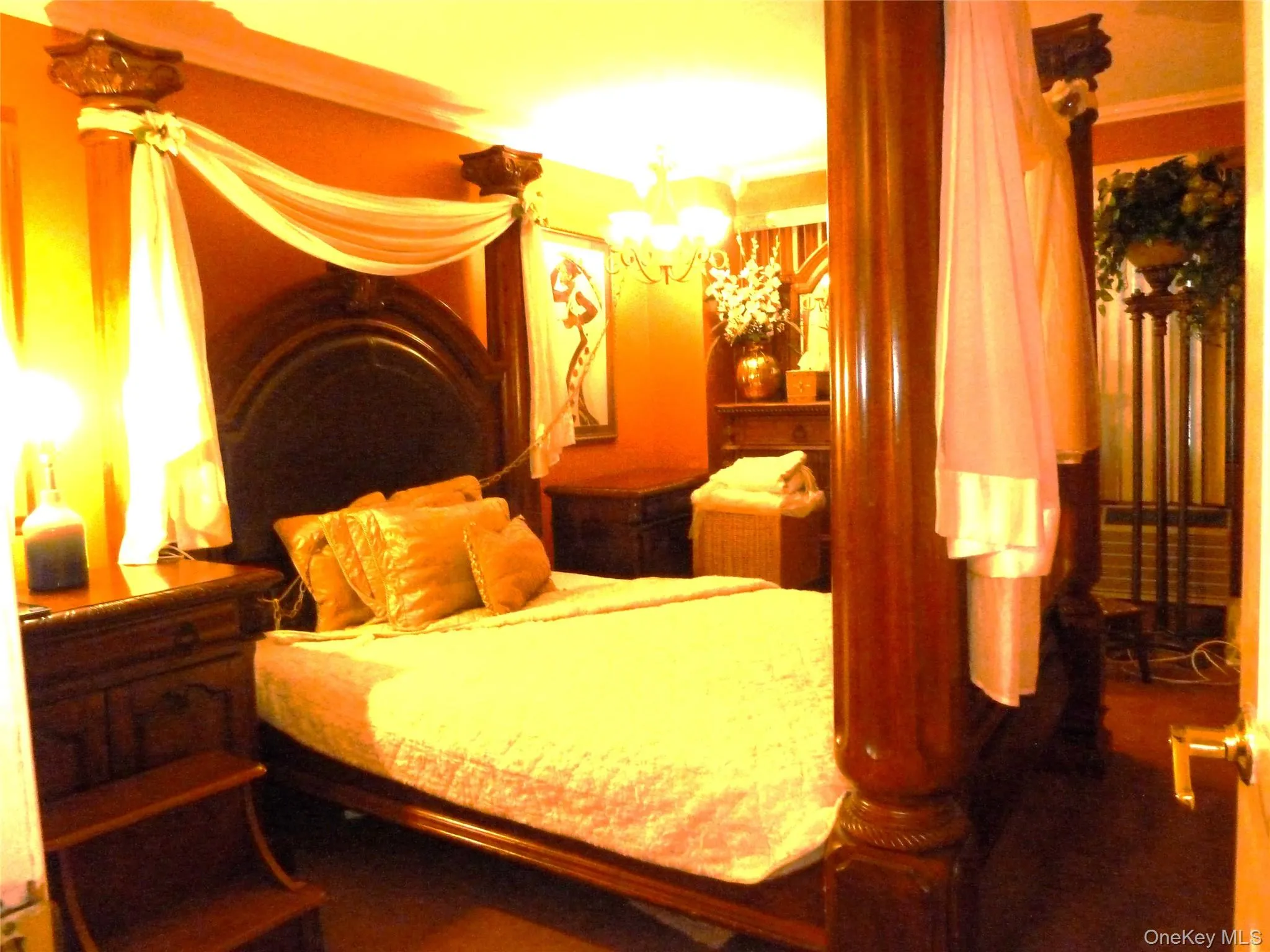 2nd Bedroom providing space for large furniture pieces, beautiful wood mouldings highlight the ceiling and create a royal, peaceful sleeping situation. 2nd Bedroom providing space for large furniture pieces, beautiful wood mouldings highlight the ceiling and create a royal, peaceful sleeping situation.