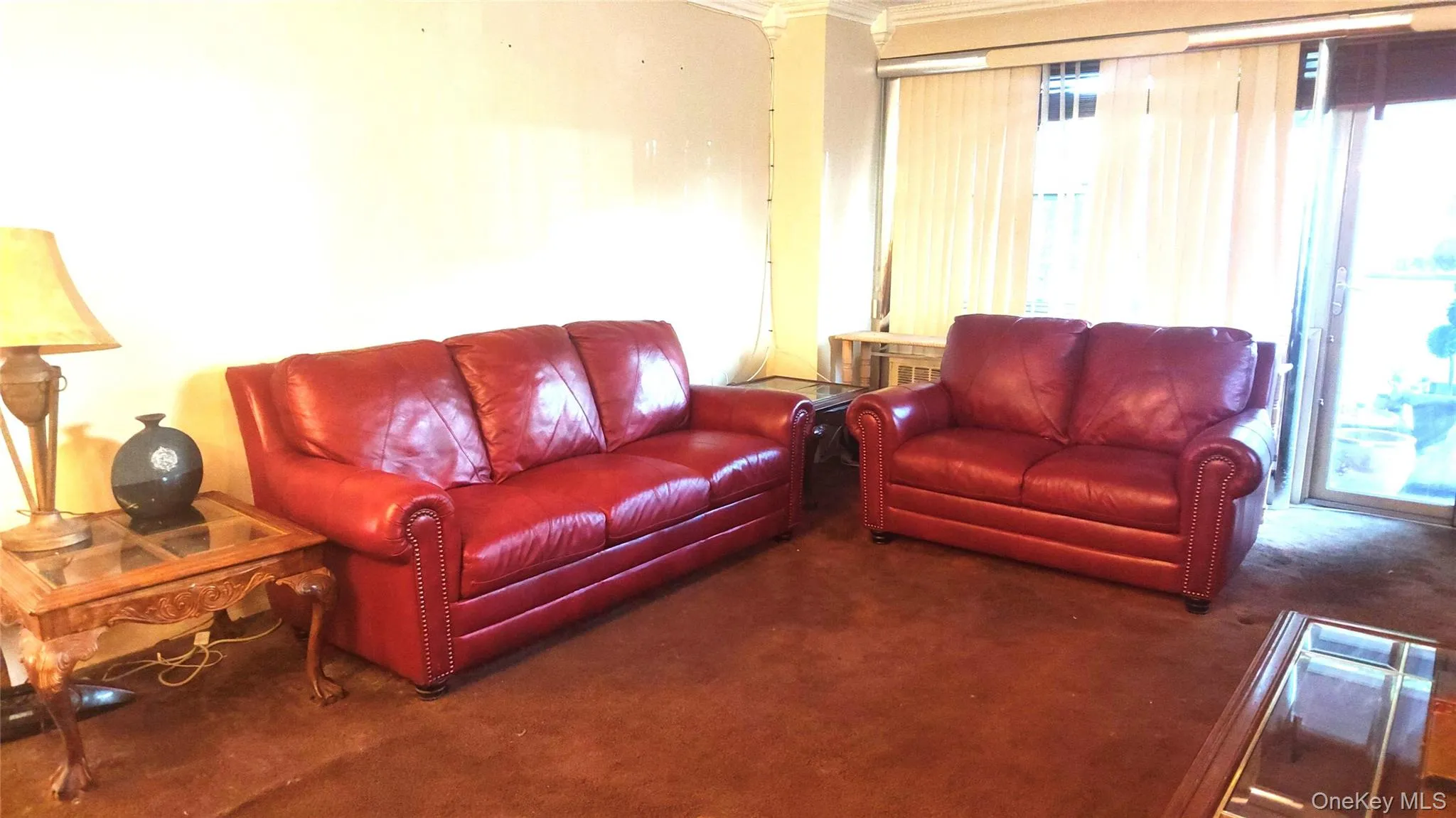 Separate formal living room space with access to screened-in balcony Separate formal living room space with access to screened-in balcony