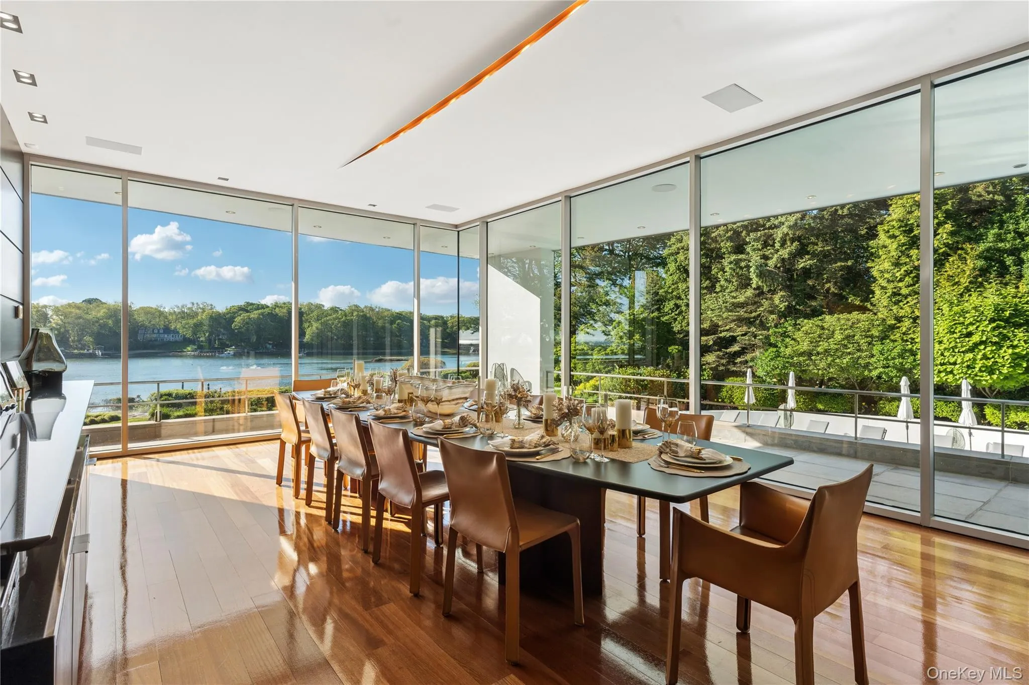 Formal Dining Room with Stunning Water Views Formal Dining Room with Stunning Water Views