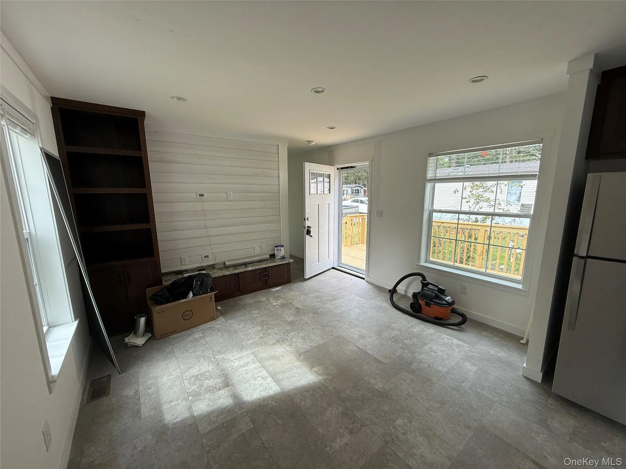 Unfurnished dining area featuring baseboards and recessed lighting Unfurnished dining area featuring baseboards and recessed lighting