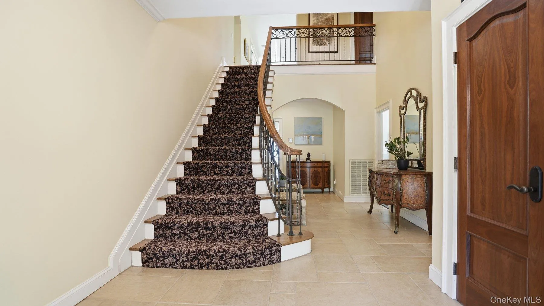 Entrance Foyer and Stairs to 2nd Floor Entrance Foyer and Stairs to 2nd Floor
