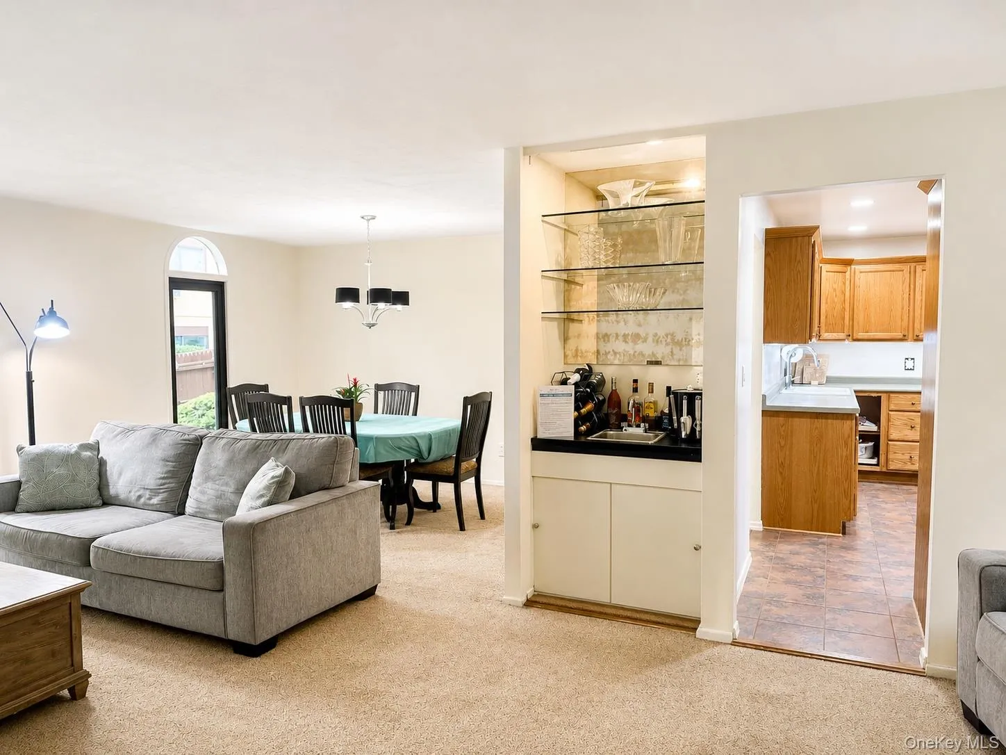 Living Room w/Wet Bar, Dining Room, & Kitchen Living Room w/Wet Bar, Dining Room, & Kitchen