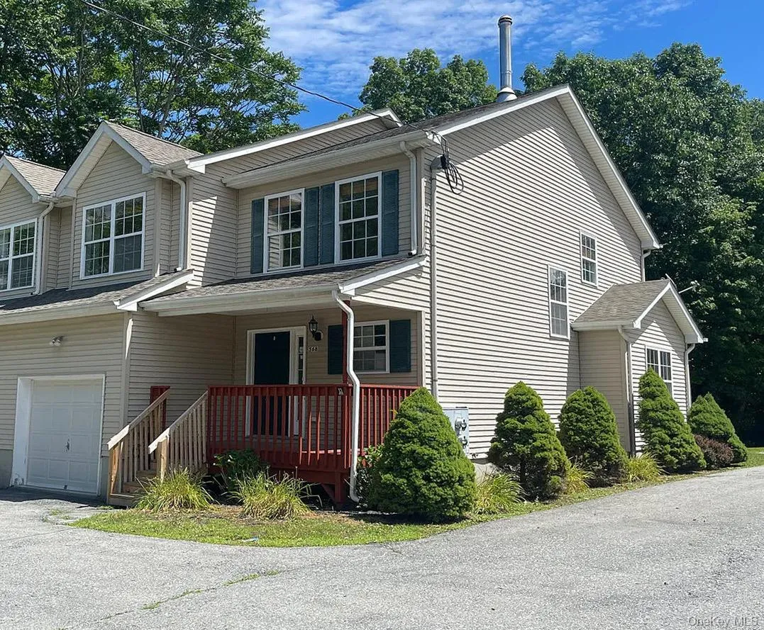 View of front of property featuring an attached garage View of front of property featuring an attached garage