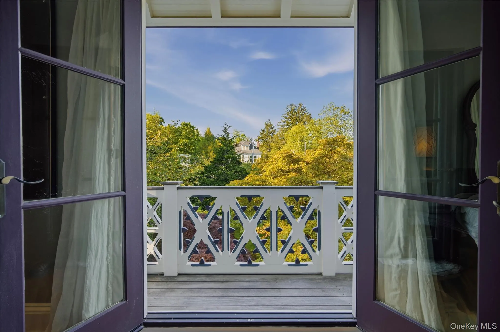 Juliet balcony featuring intricate scrollwork and balusters Juliet balcony featuring intricate scrollwork and balusters