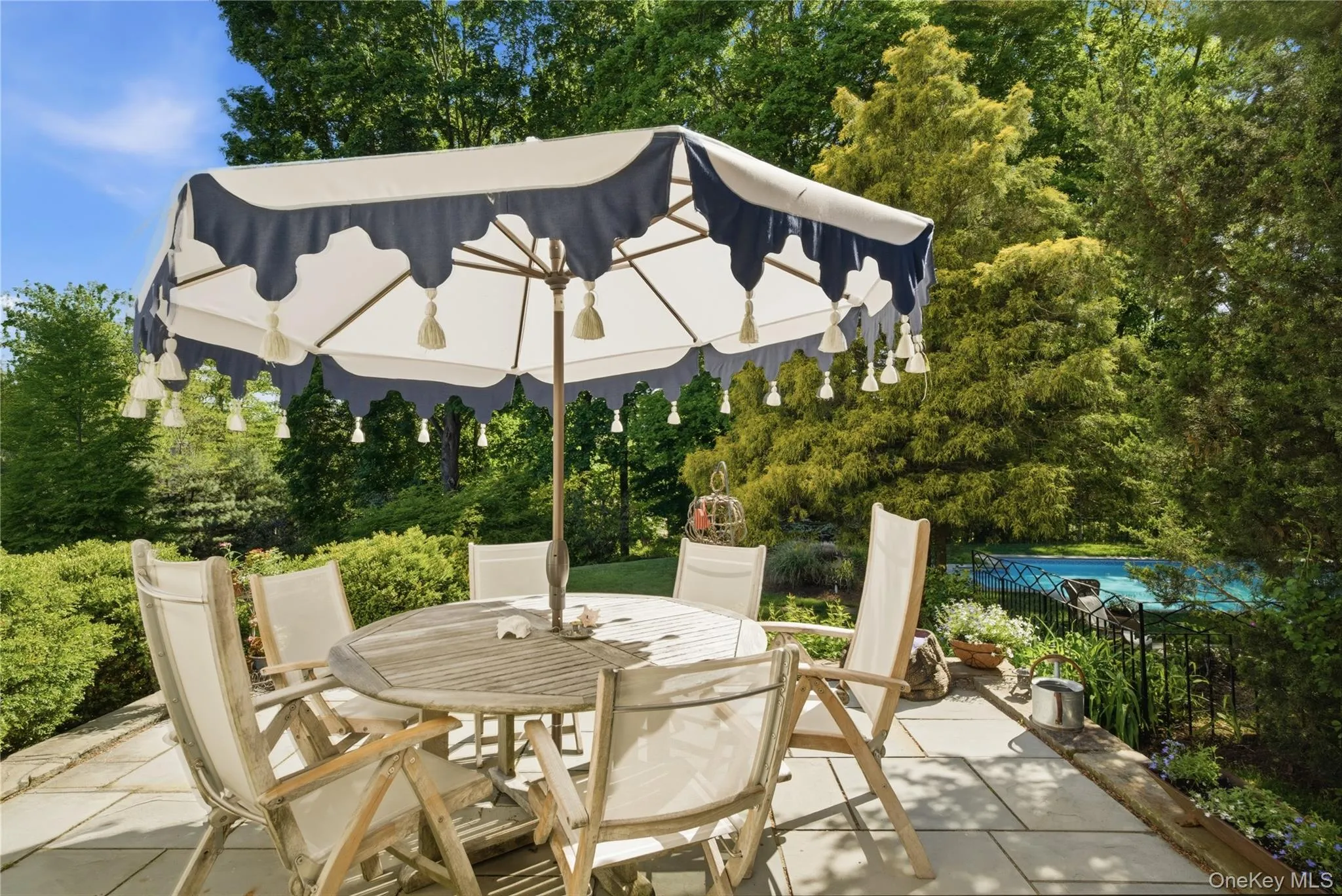 Back porch offers dining and lounging areas Back porch offers dining and lounging areas