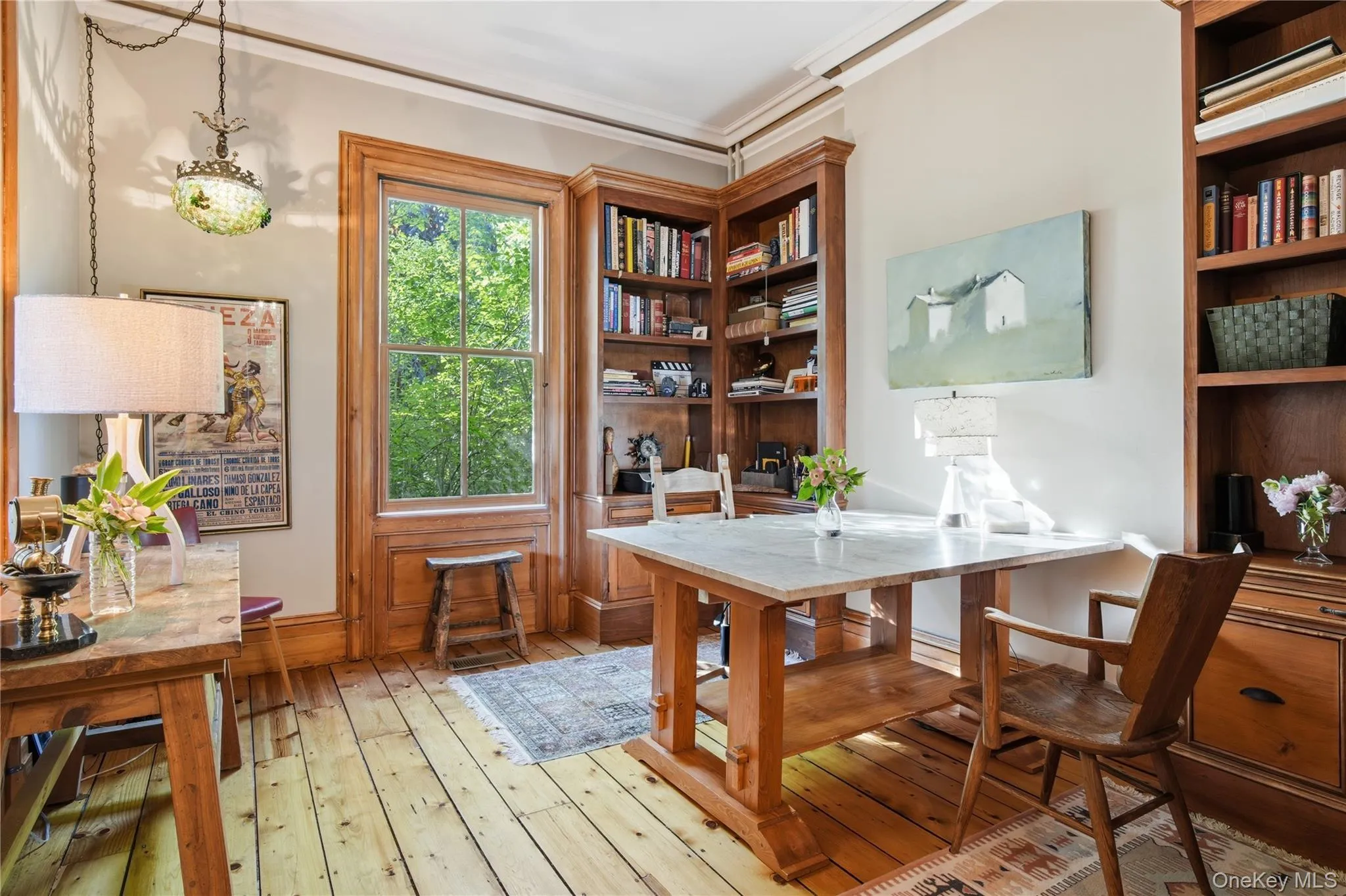 Main floor office with built in woodwork could easily transfer to a main floor primary Main floor office with built in woodwork could easily transfer to a main floor primary