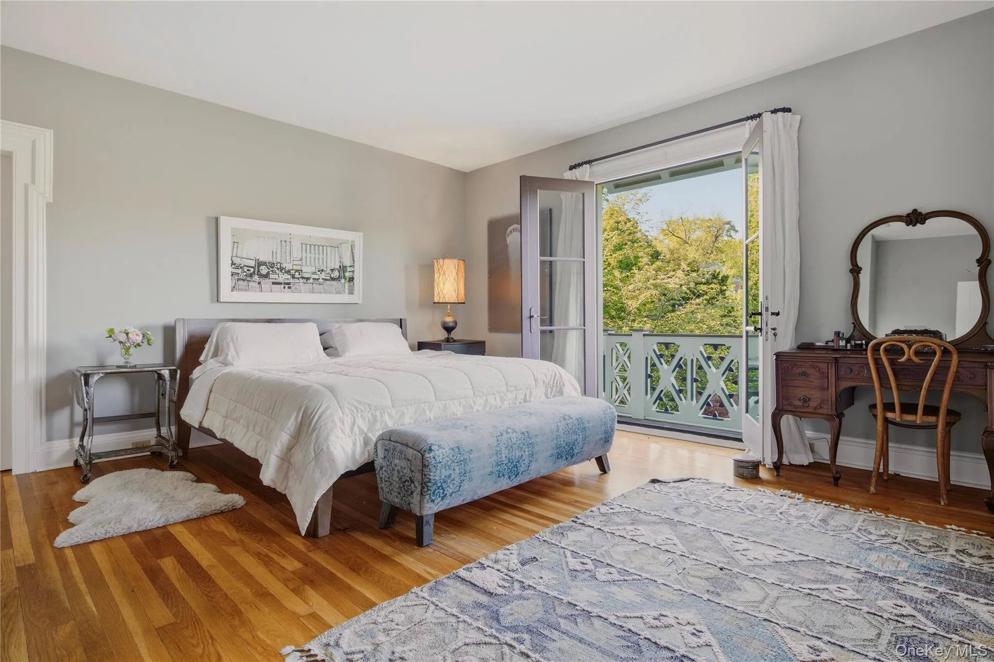 Offers mountain views and juliet balcony outside tall french doors Offers mountain views and juliet balcony outside tall french doors