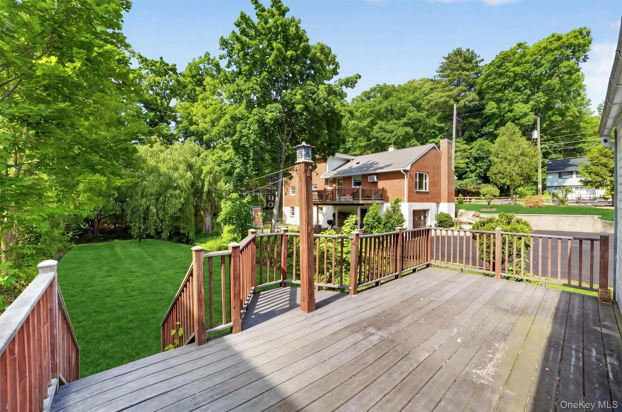 Large back deck over the stunning yard! Large back deck over the stunning yard!