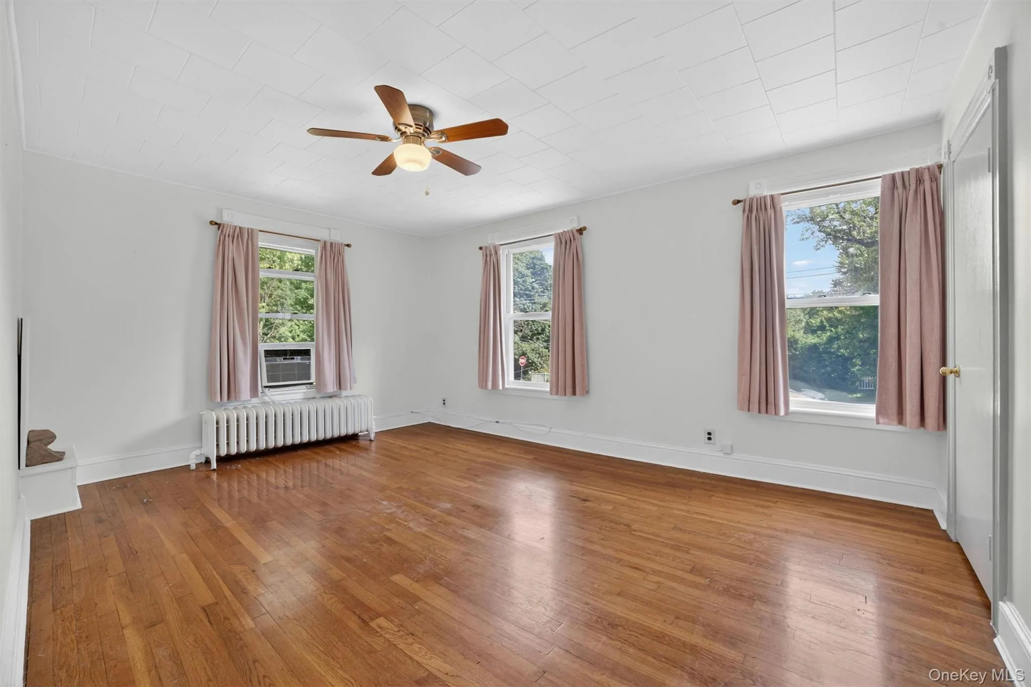 Extra large primary bedroom with tons of natural light, large closet and ceiling fan. Second floor. Extra large primary bedroom with tons of natural light, large closet and ceiling fan. Second floor.