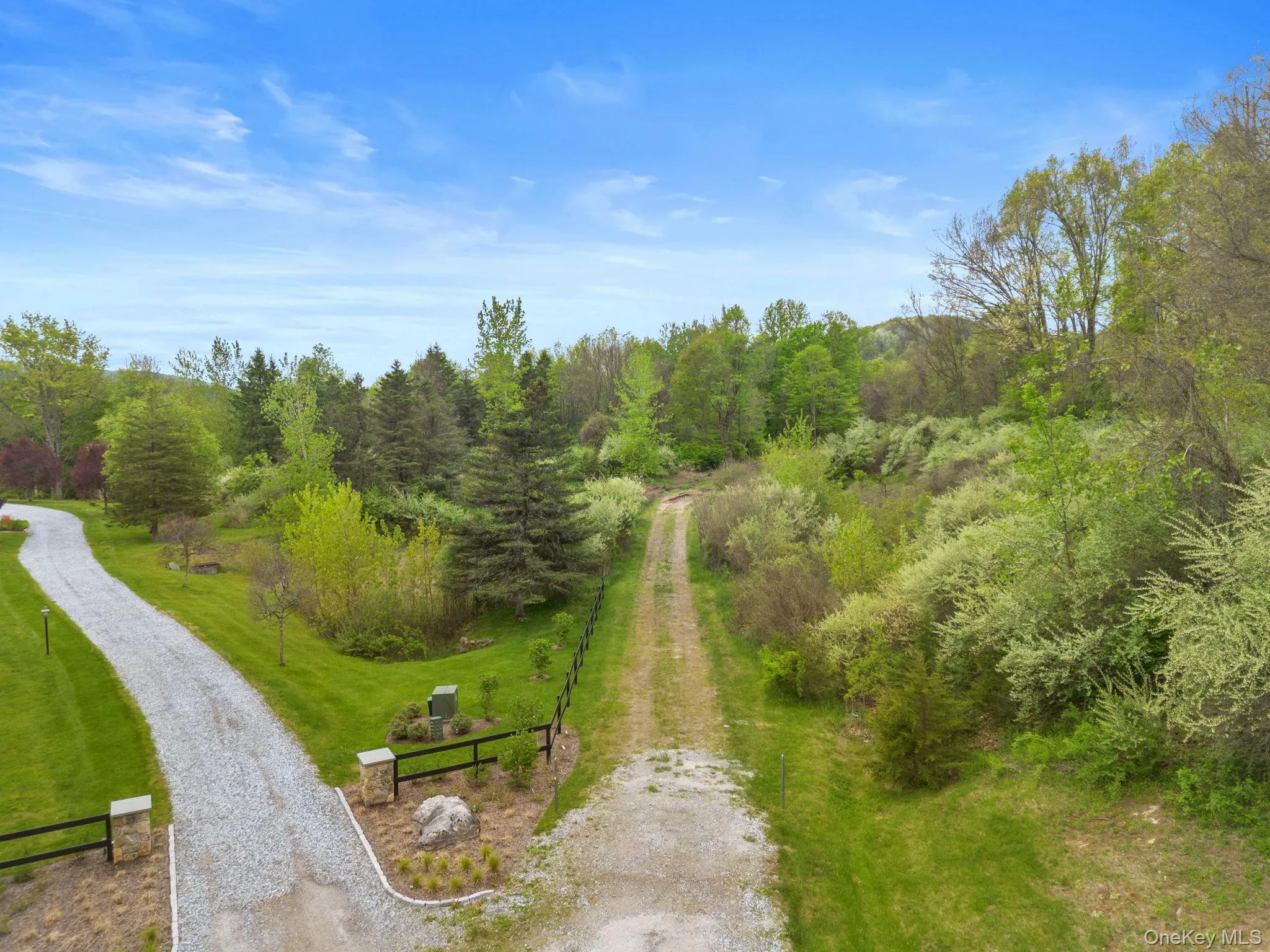 The country road splits to the right and leads you to the property The country road splits to the right and leads you to the property