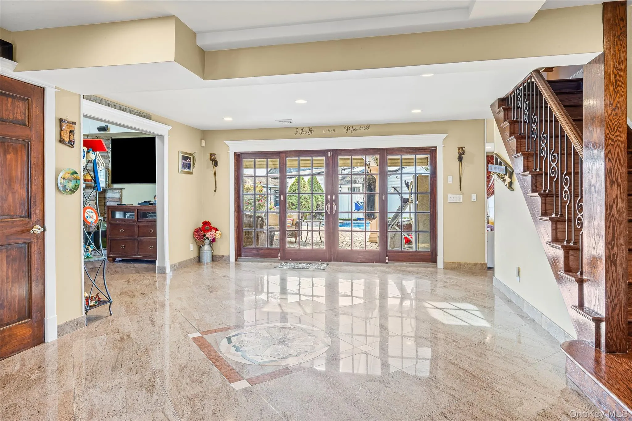 Building lobby with stairs and recessed lighting Building lobby with stairs and recessed lighting