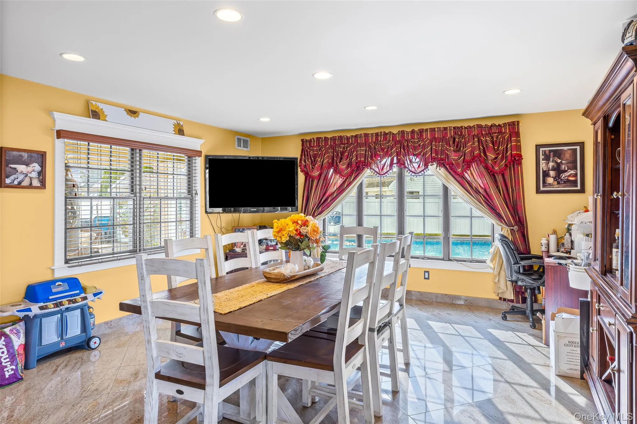 Dining area featuring recessed lighting and baseboards Dining area featuring recessed lighting and baseboards