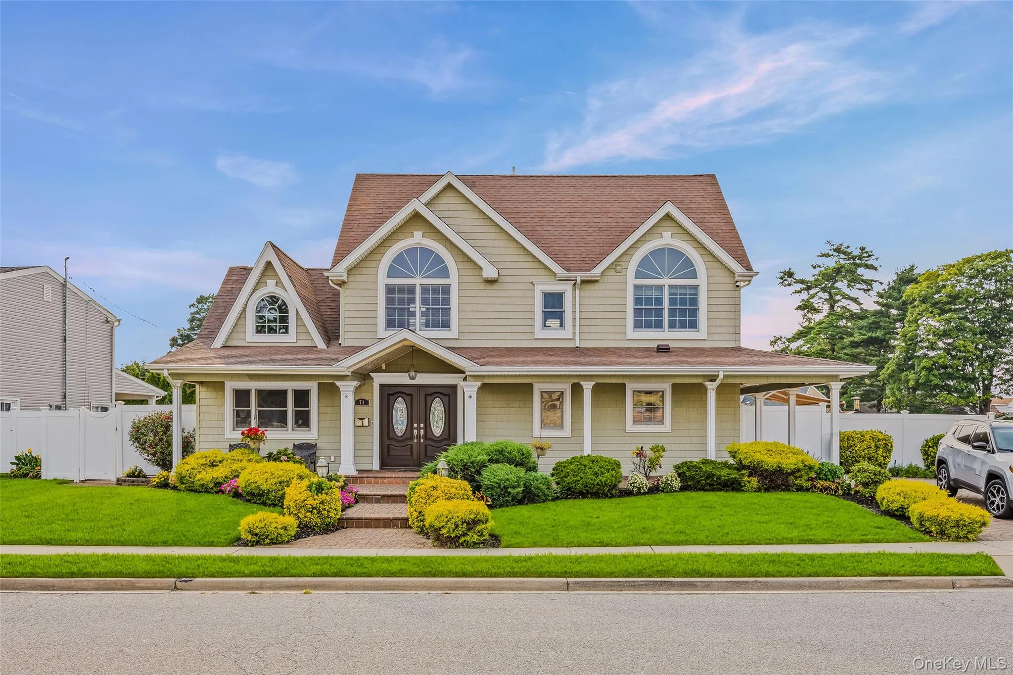 View of front of property with a porch and roof with shingles View of front of property with a porch and roof with shingles