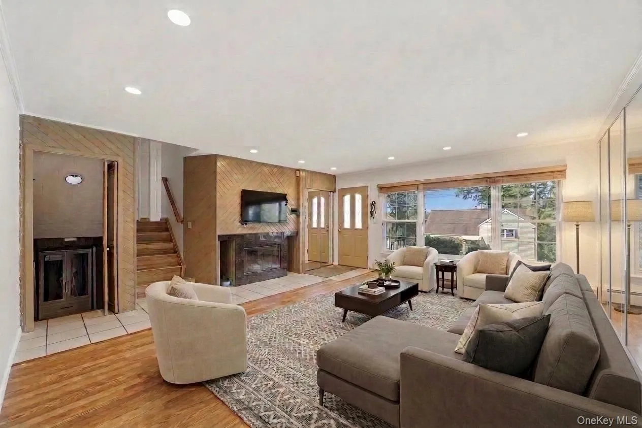 Living area featuring recessed lighting and hardwood-finish flooring (Virtually Staged) Living area featuring recessed lighting and hardwood-finish flooring (Virtually Staged)