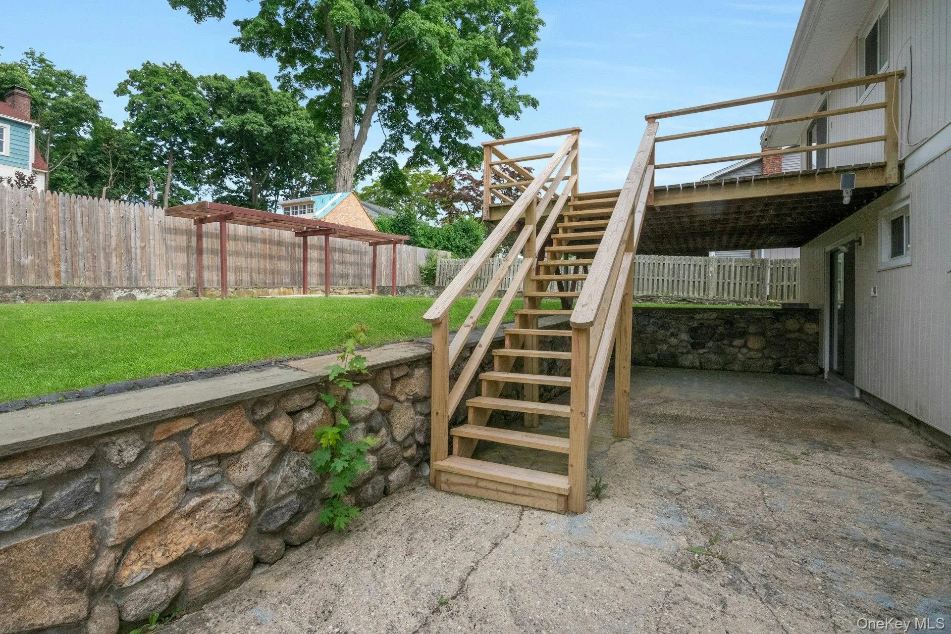 New stairs to deck, private patio has sliding doors to lower level New stairs to deck, private patio has sliding doors to lower level