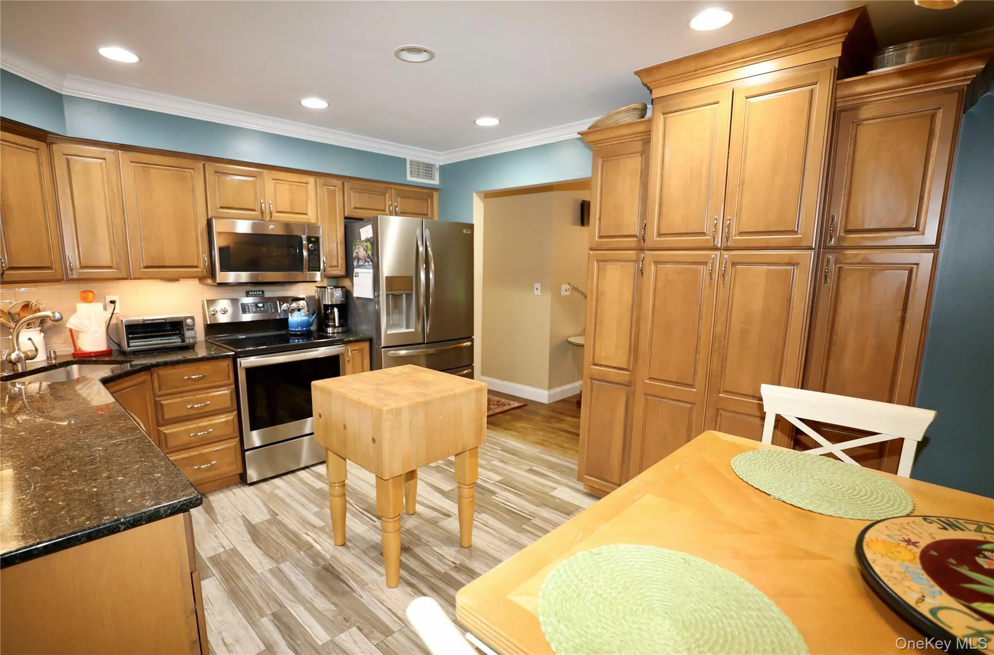 Kitchen with floor to ceiling pantry cabinets Kitchen with floor to ceiling pantry cabinets