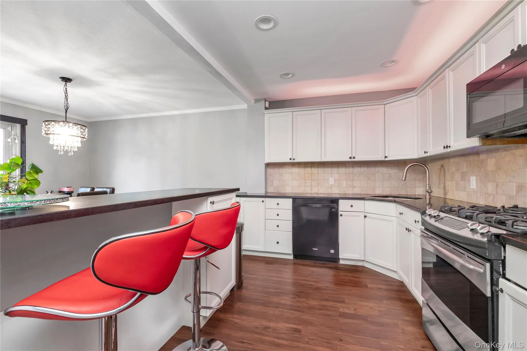 Stainless Steel appliances and breakfast bar Stainless Steel appliances and breakfast bar
