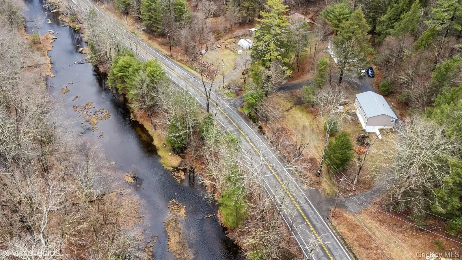 Birds eye view of property with a water view Birds eye view of property with a water view
