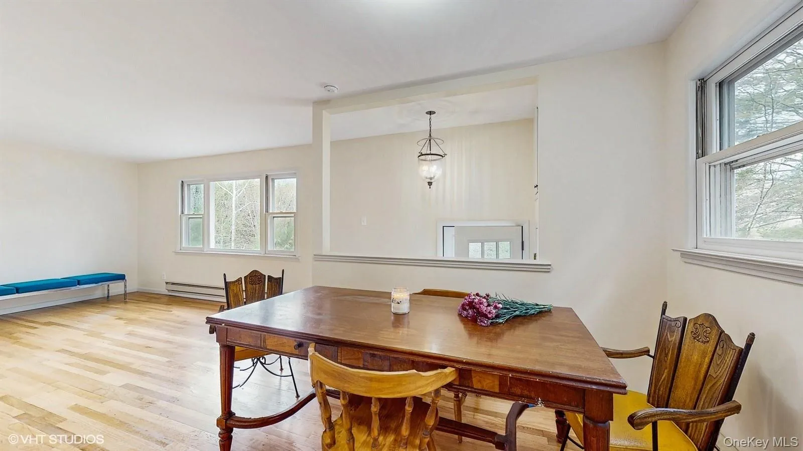 Dining room with a light wood-style flooring Dining room with a light wood-style flooring