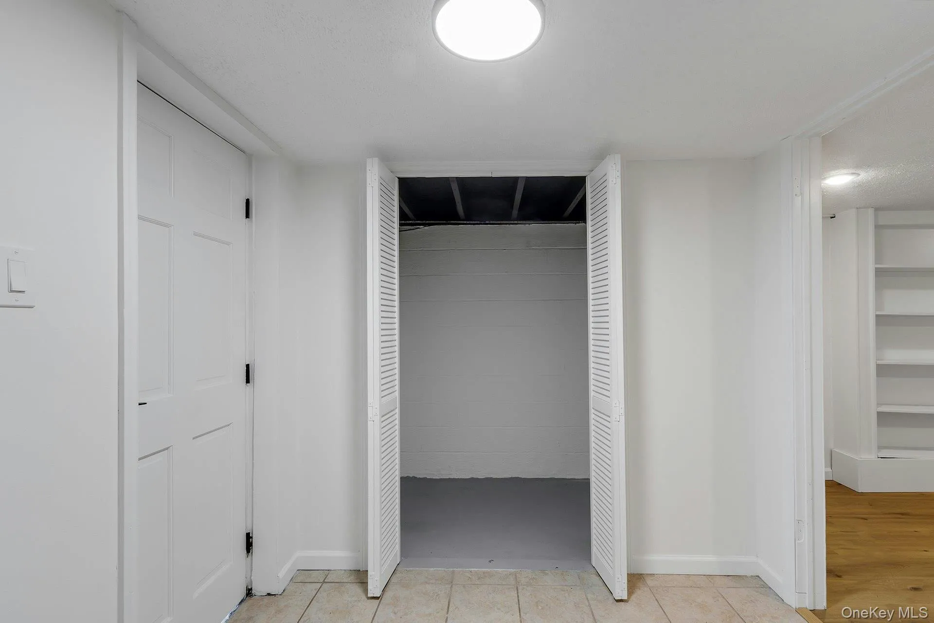 Storage in basement right off garage entrance Storage in basement right off garage entrance