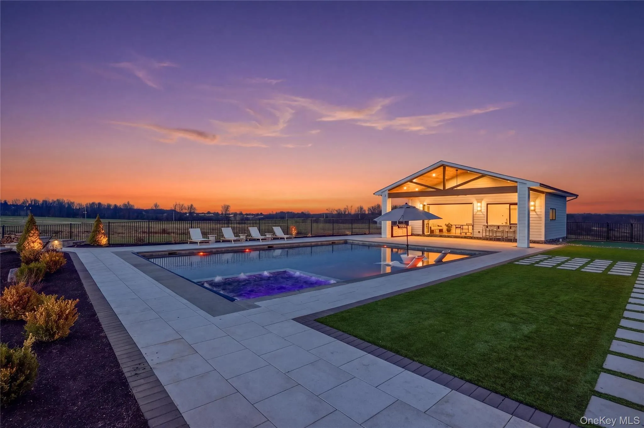 Pool house with vaulted ceilings and exposed wood beams Pool house with vaulted ceilings and exposed wood beams