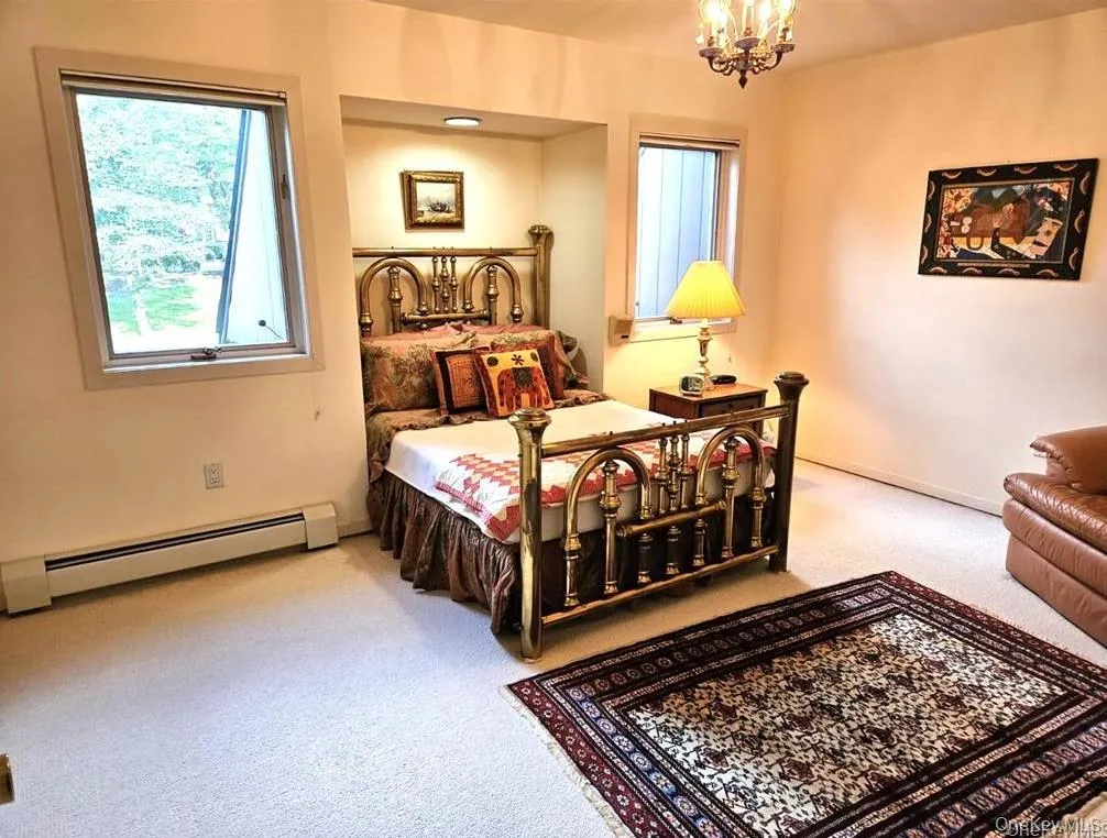 Spacious Bedroom with Wall of Closets and Built-In Spacious Bedroom with Wall of Closets and Built-In