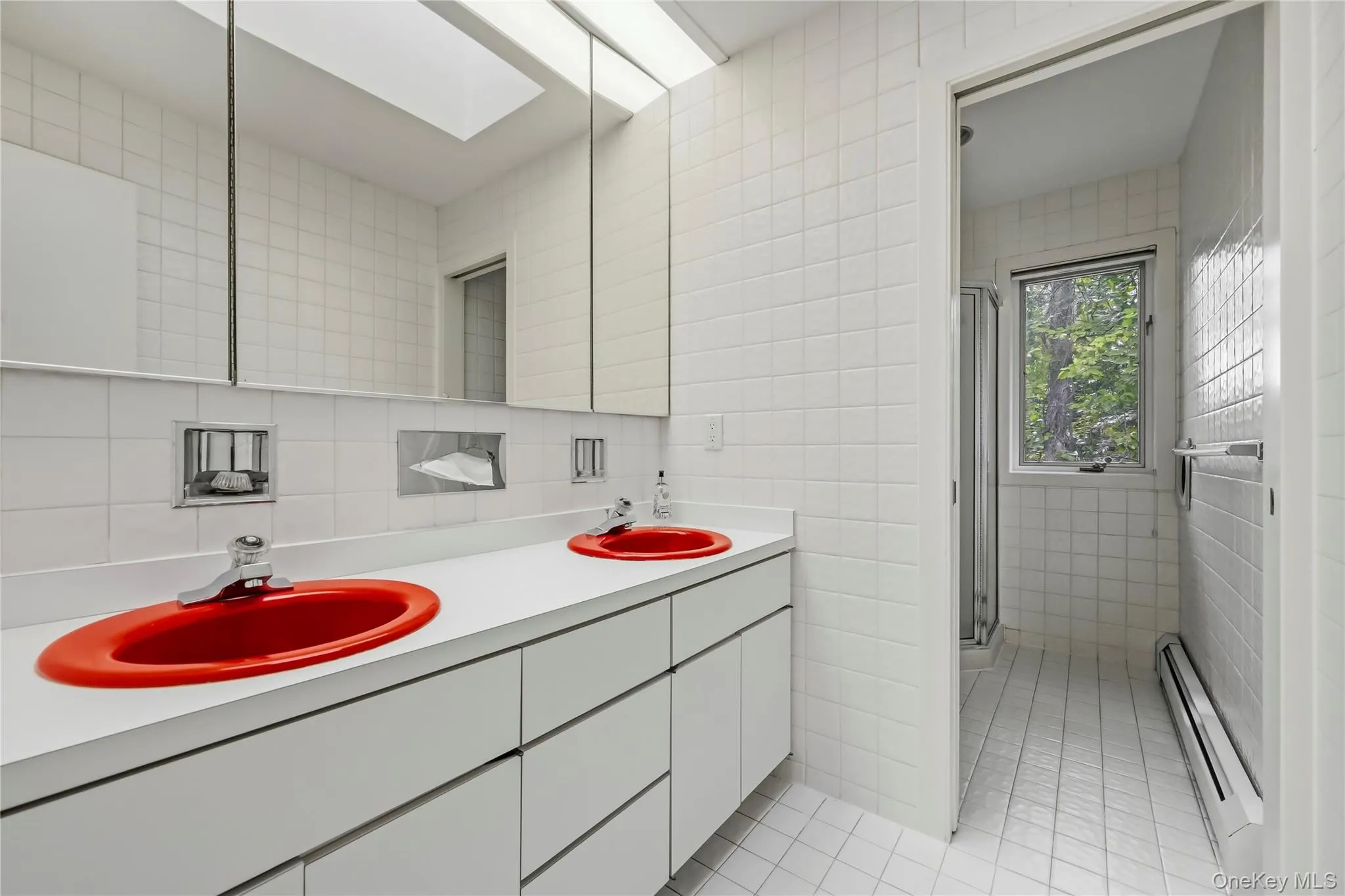 Hall Bathroom, Skylight, Shower, Pocket Door, White Tiled Walls Hall Bathroom, Skylight, Shower, Pocket Door, White Tiled Walls