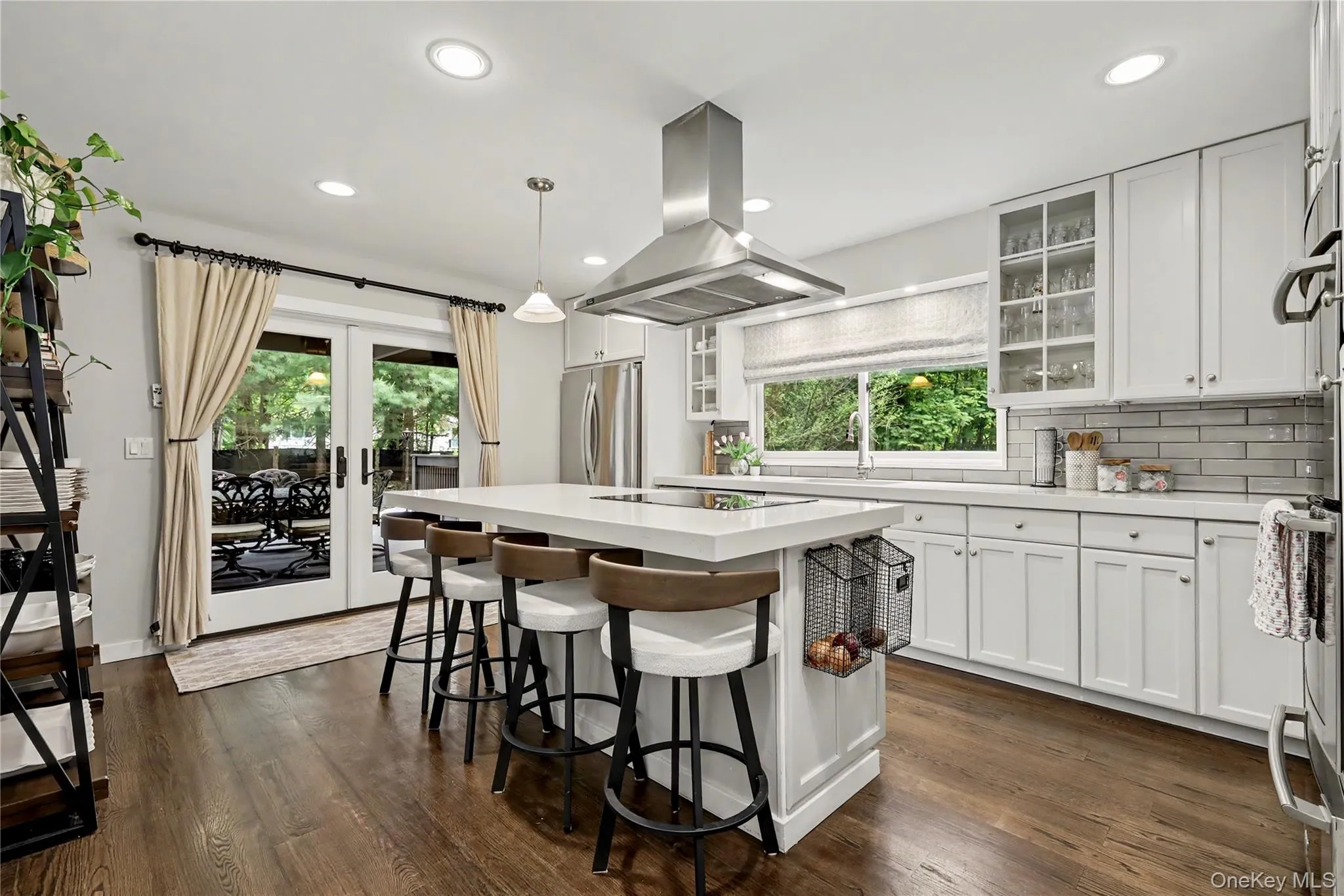 Thoughtfully designed kitchen with stainless steel appliances, quartz countertop and 42" upper cabinets. Thoughtfully designed kitchen with stainless steel appliances, quartz countertop and 42" upper cabinets.