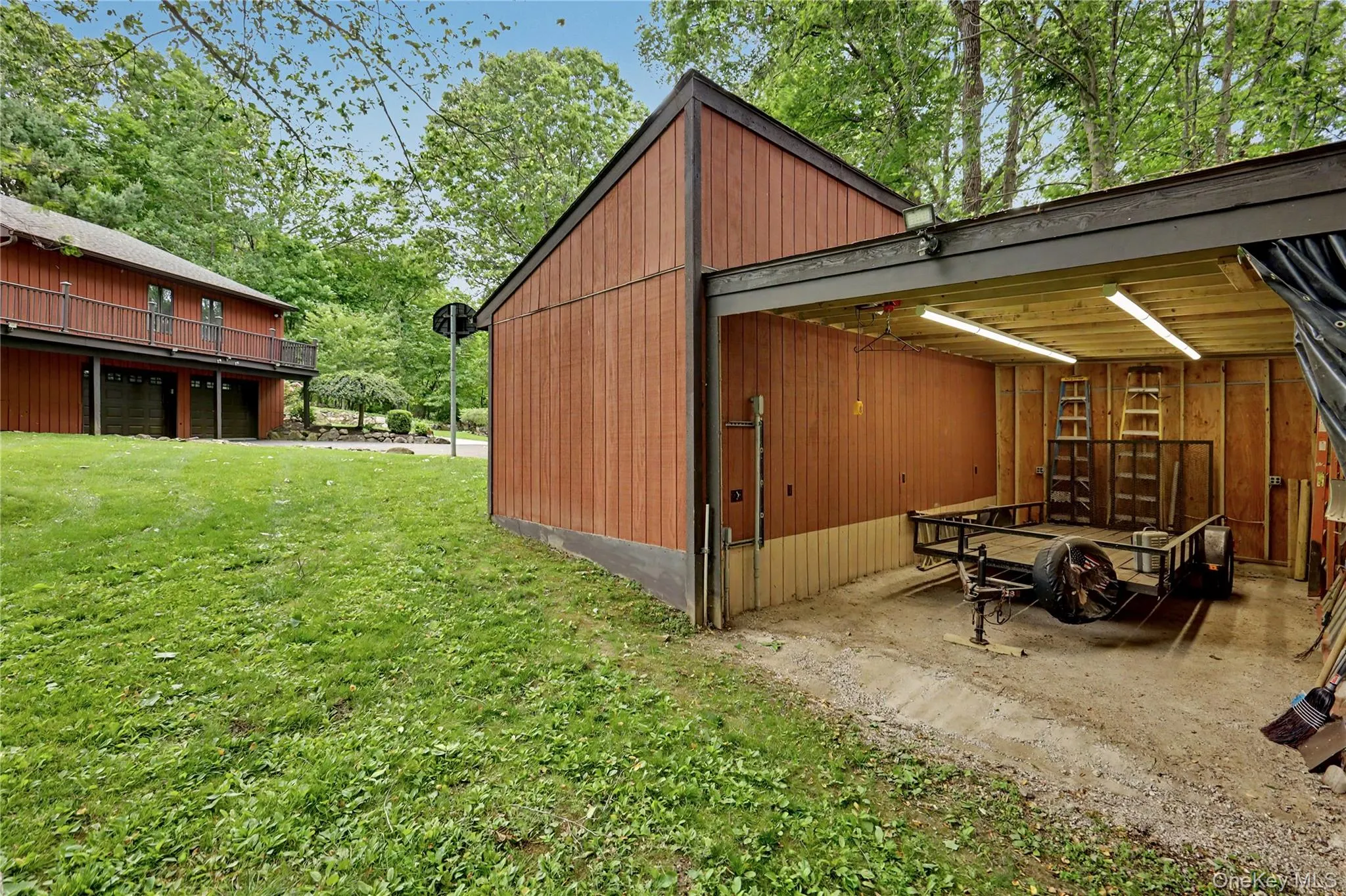 Attached trailer and tool shed with electric and lighting. Attached trailer and tool shed with electric and lighting.