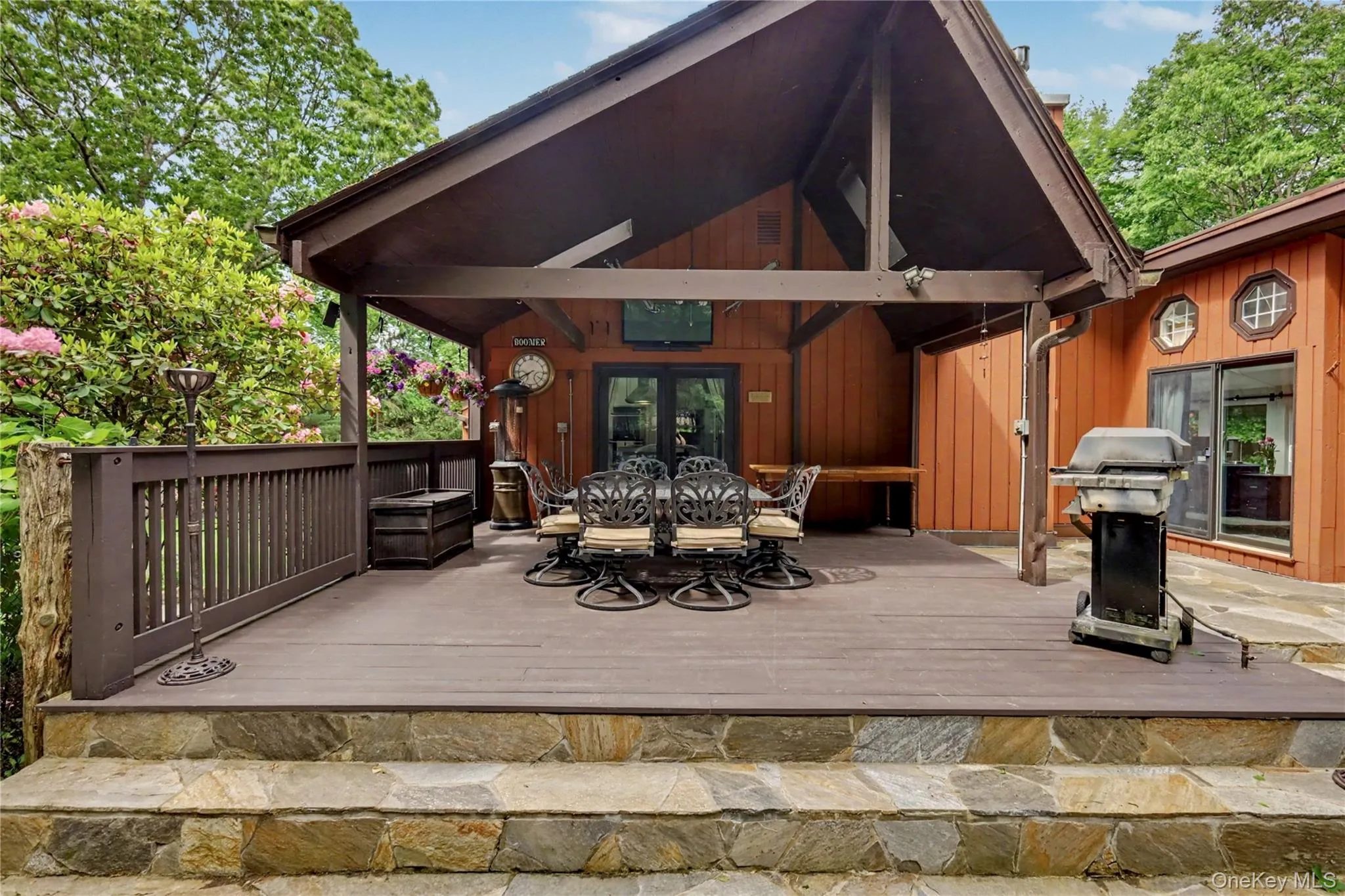 Enjoy your yard year round with this amazing covered Mahogany deck off kitchen. Enjoy your yard year round with this amazing covered Mahogany deck off kitchen.