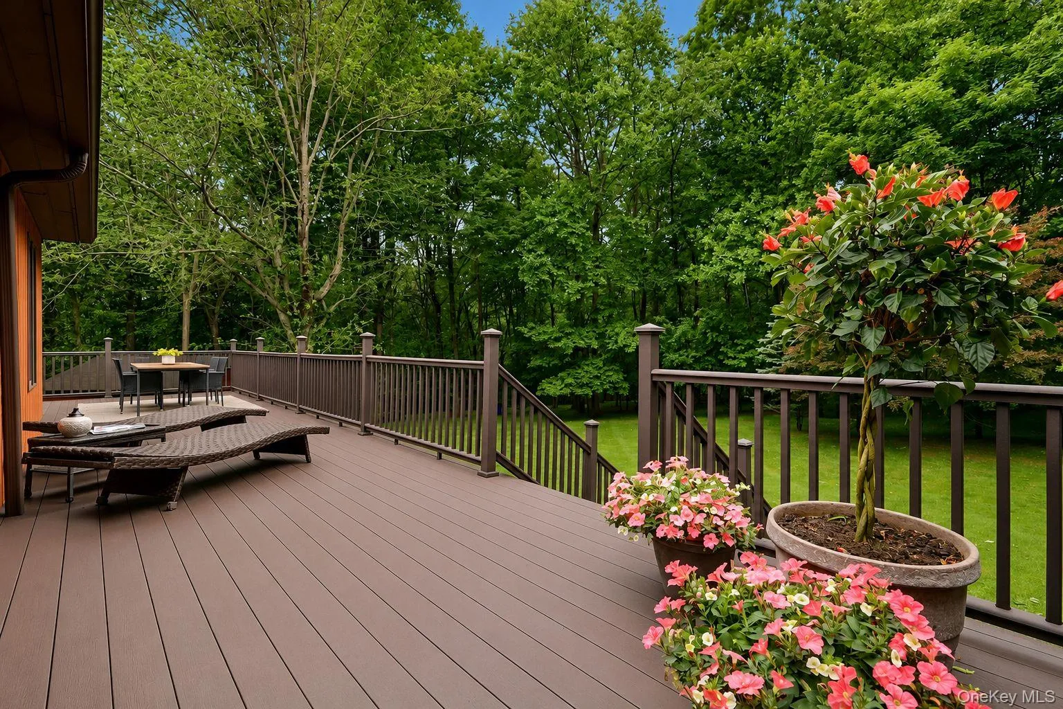 For those who value privacy, the wrap around deck is surrounded by mature trees, offering a peaceful escape and seamless connection to nature. For those who value privacy, the wrap around deck is surrounded by mature trees, offering a peaceful escape and seamless connection to nature.