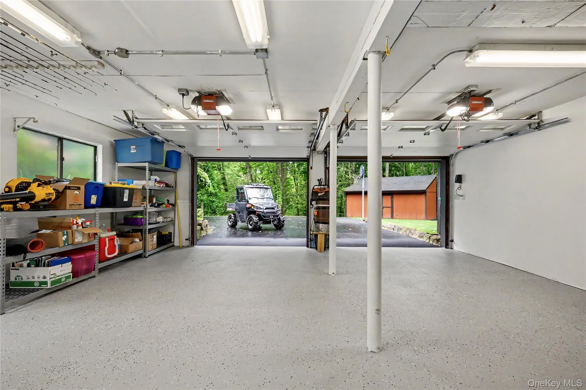 An immaculate two car garage plus storage and trailer shed provide ample room for all your outdoor equipment, hobbies, recreational gear and storage needs. An immaculate two car garage plus storage and trailer shed provide ample room for all your outdoor equipment, hobbies, recreational gear and storage needs.