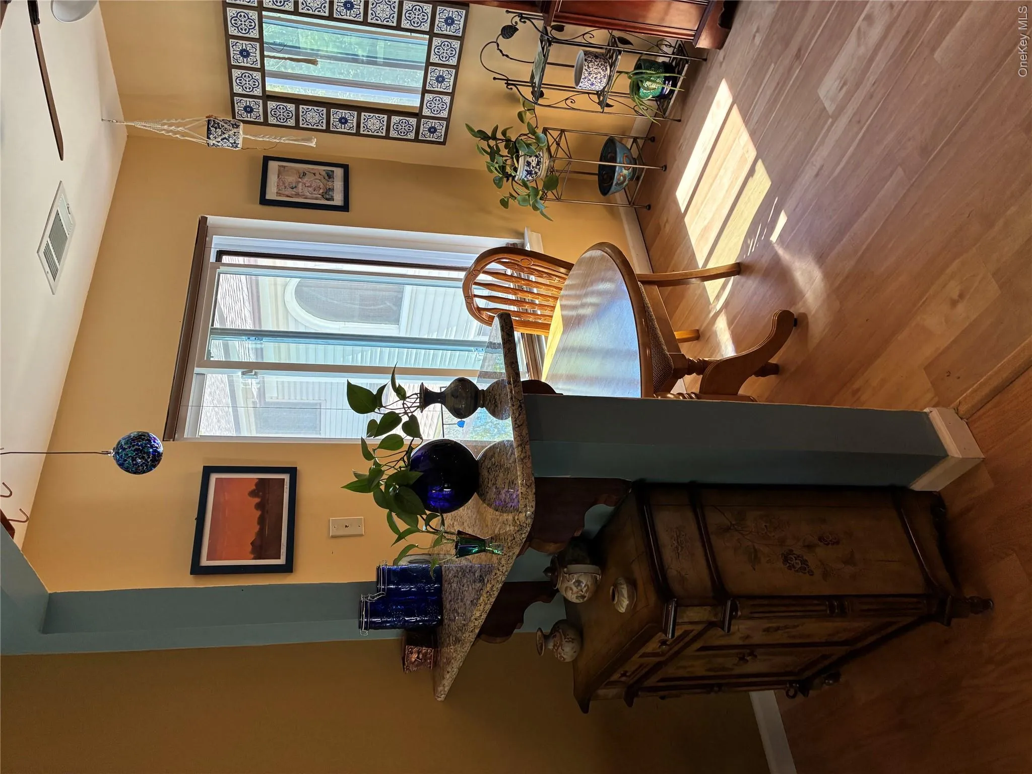 Kitchen nook area with table off Galley kitchen view (1) Kitchen nook area with table off Galley kitchen view (1)