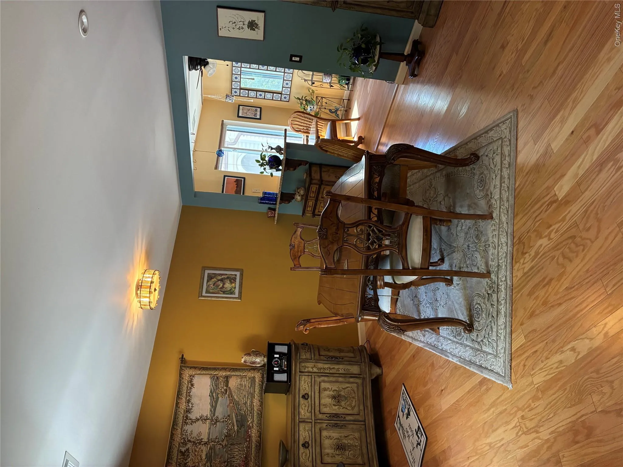 Dining room with DR Hutch, table and Kitchen nook area in the background Dining room with DR Hutch, table and Kitchen nook area in the background