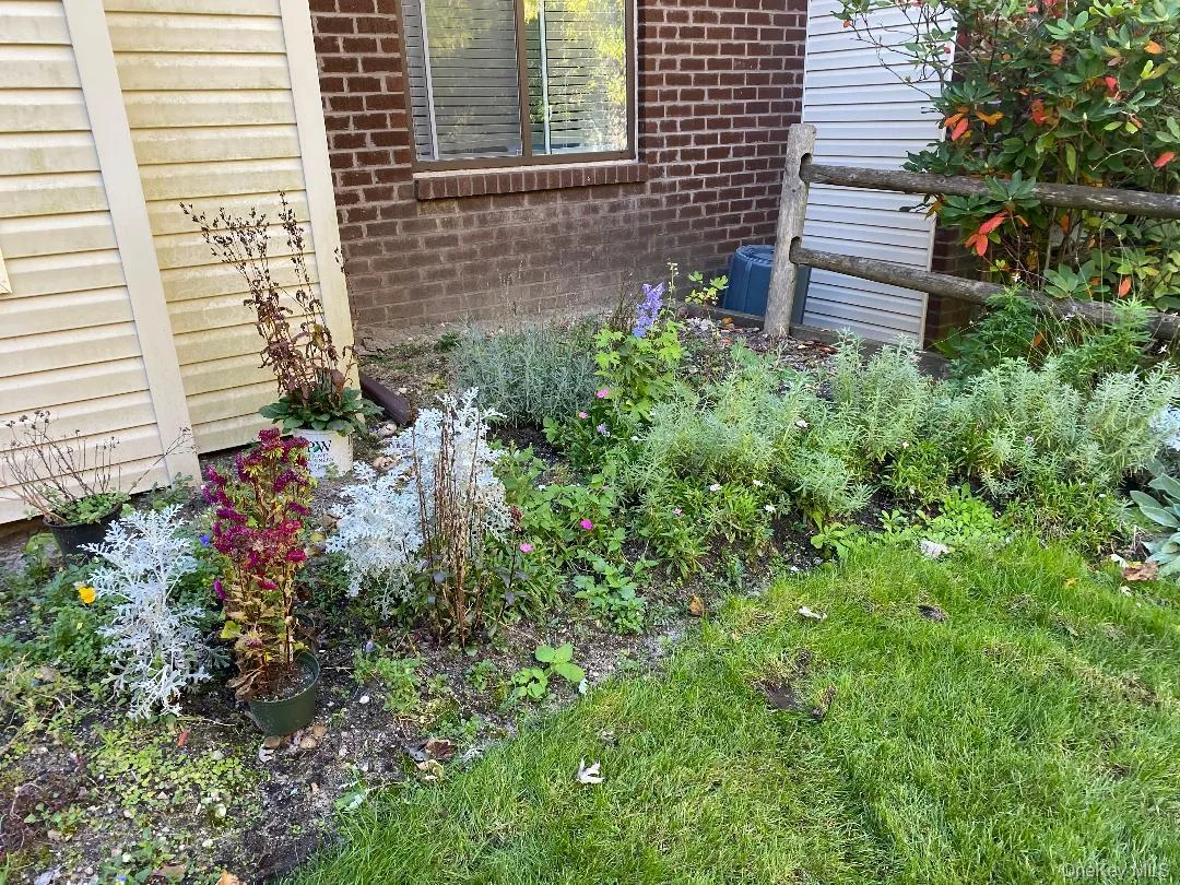 Flower garden by front door Flower garden by front door