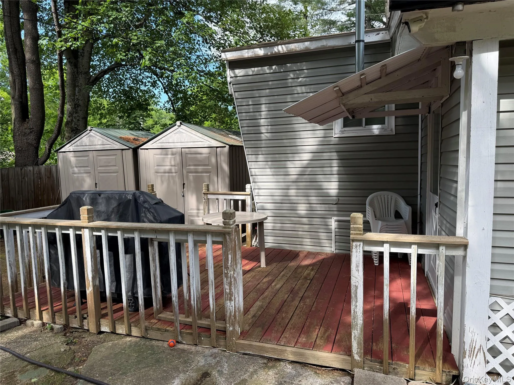 Outdoor wood deck with railing Outdoor wood deck with railing