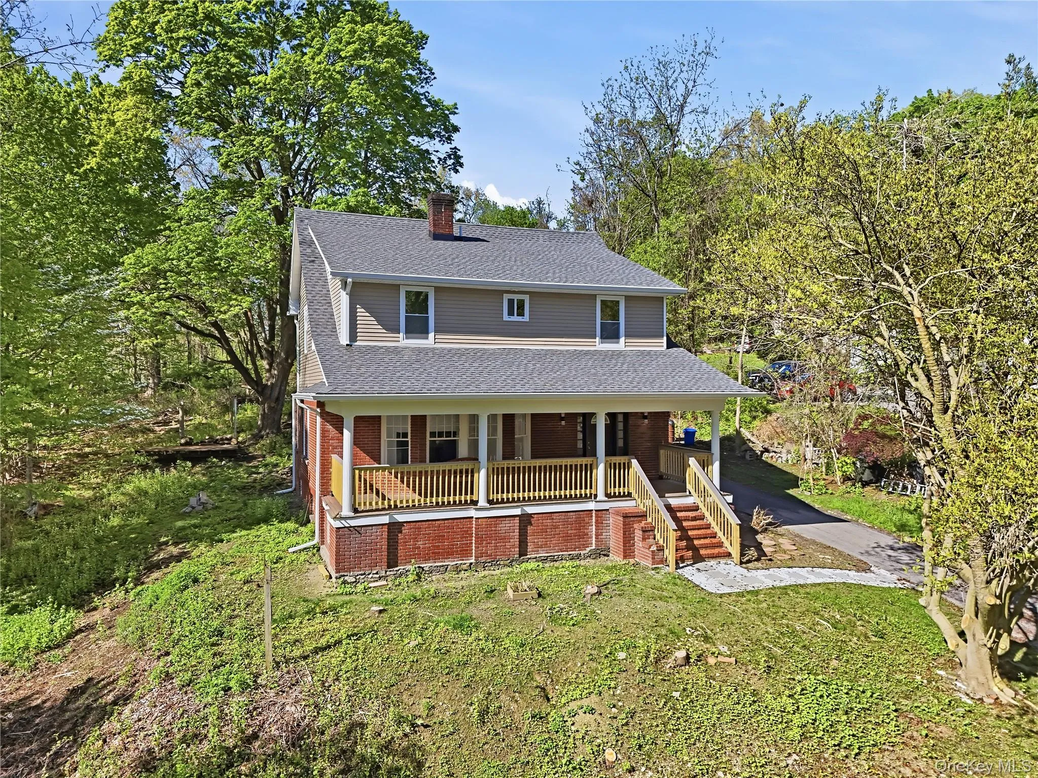 1931 colonial - brick face with vinyl siding 1931 colonial - brick face with vinyl siding
