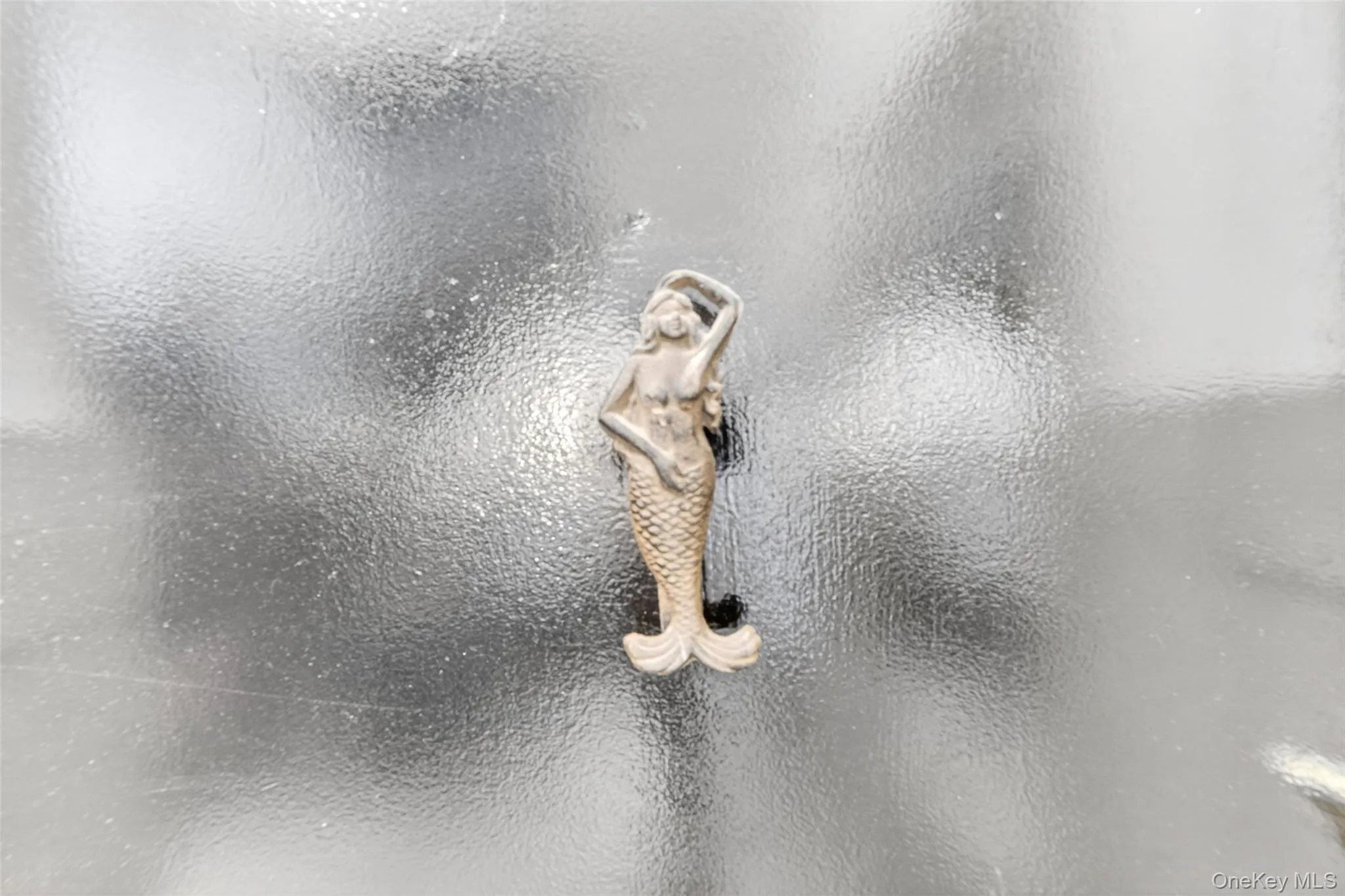 Mermaid design door knocker Mermaid design door knocker