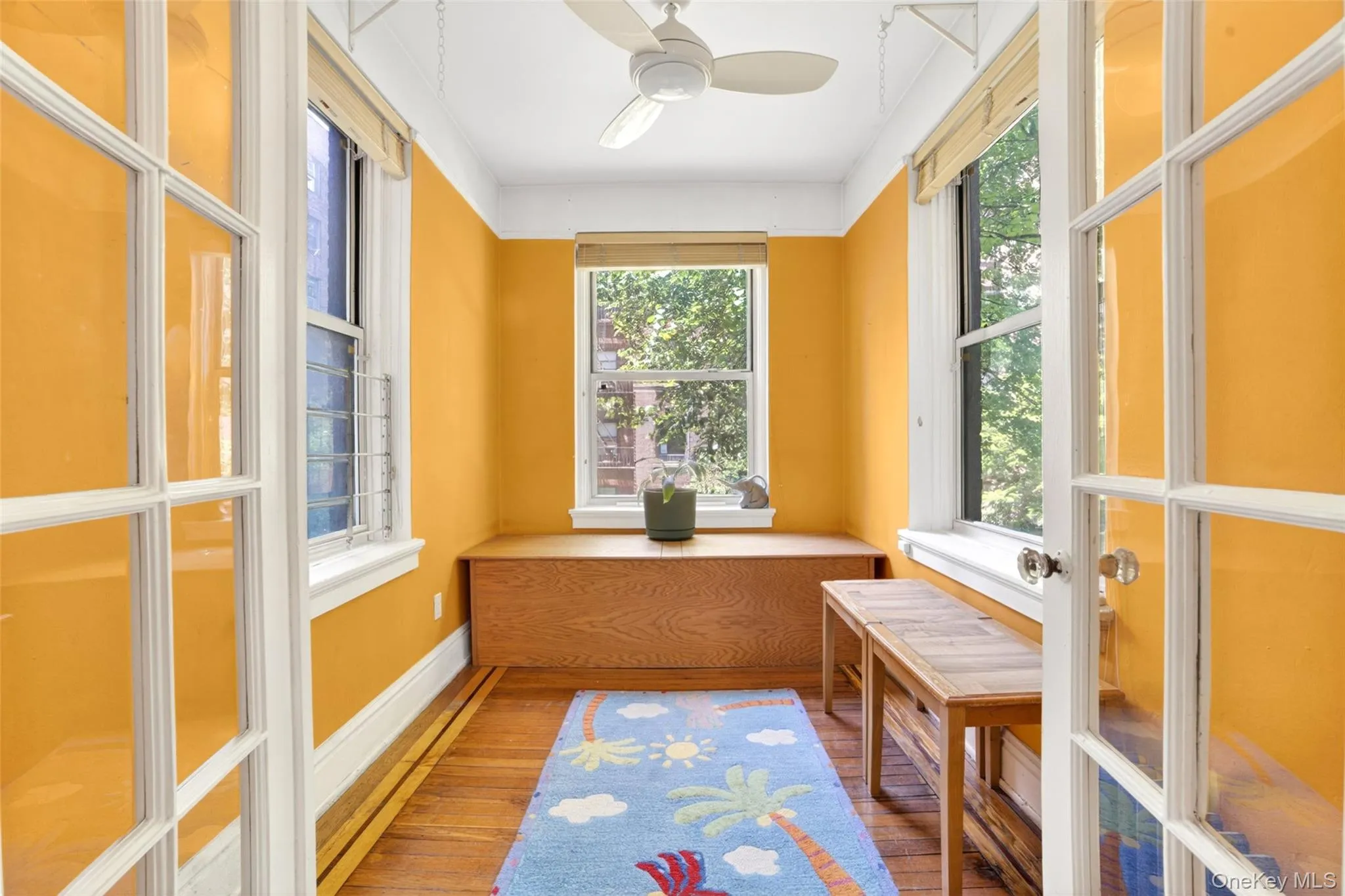 Sun room featuring french doors Sun room featuring french doors