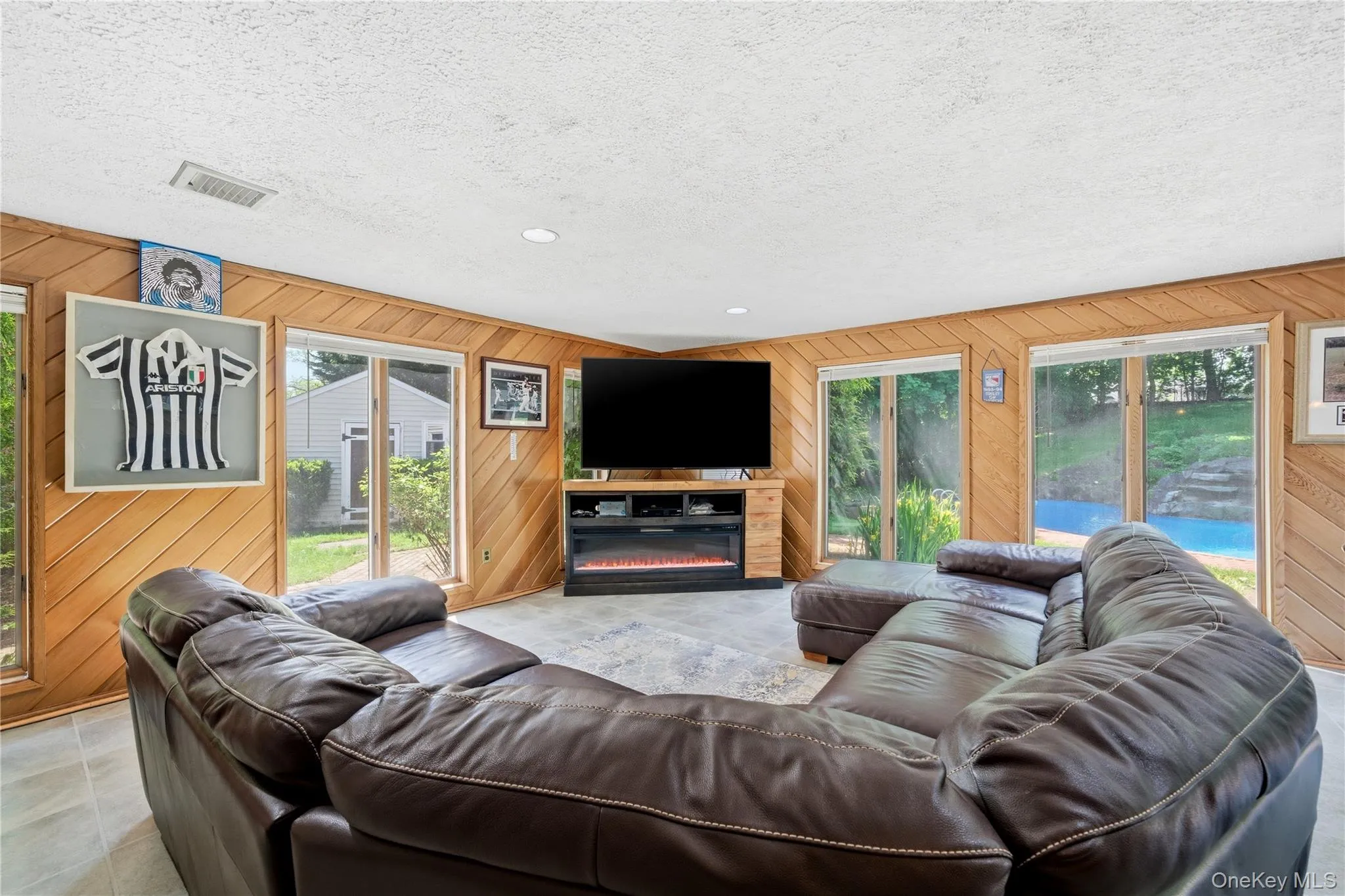 Lower Level - Recreational Room w/Floor to Ceiling Windows Throughout Lower Level - Recreational Room w/Floor to Ceiling Windows Throughout
