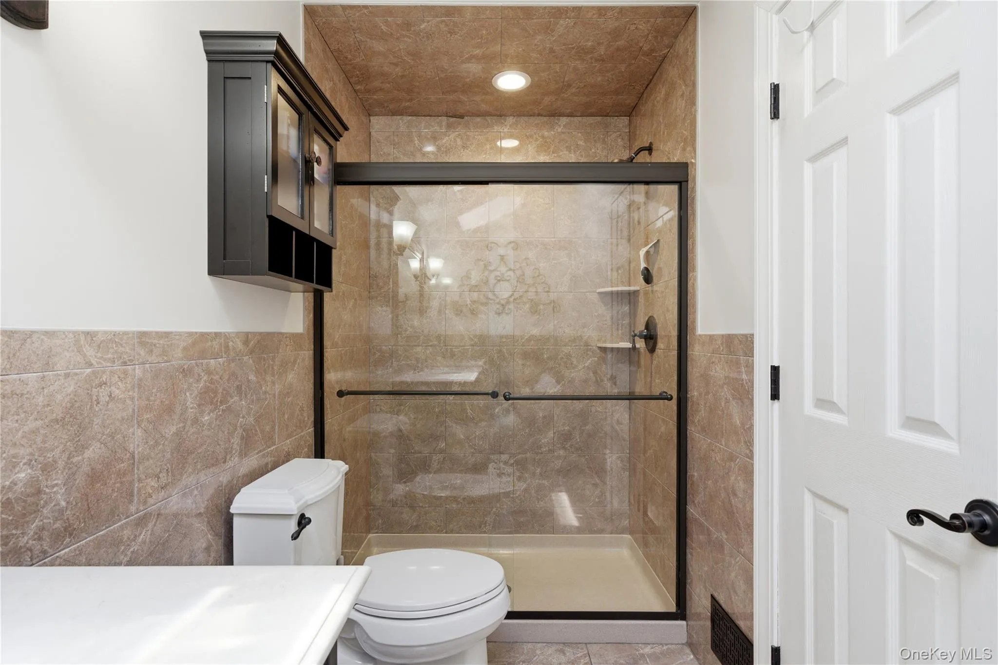 Primary Tiled Stand-Up Shower w/Glass Doors Primary Tiled Stand-Up Shower w/Glass Doors
