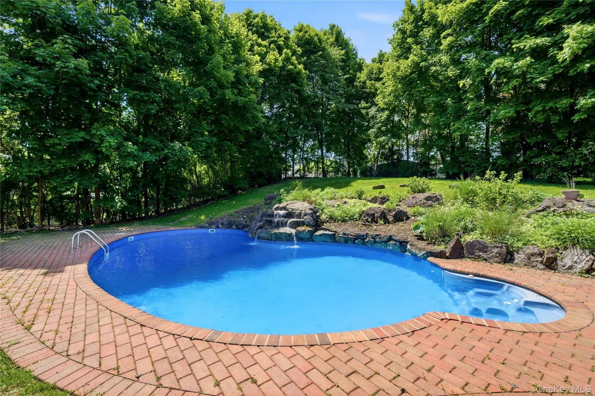 Inground Pool w/Steps & Ladder with Waterfall Inground Pool w/Steps & Ladder with Waterfall
