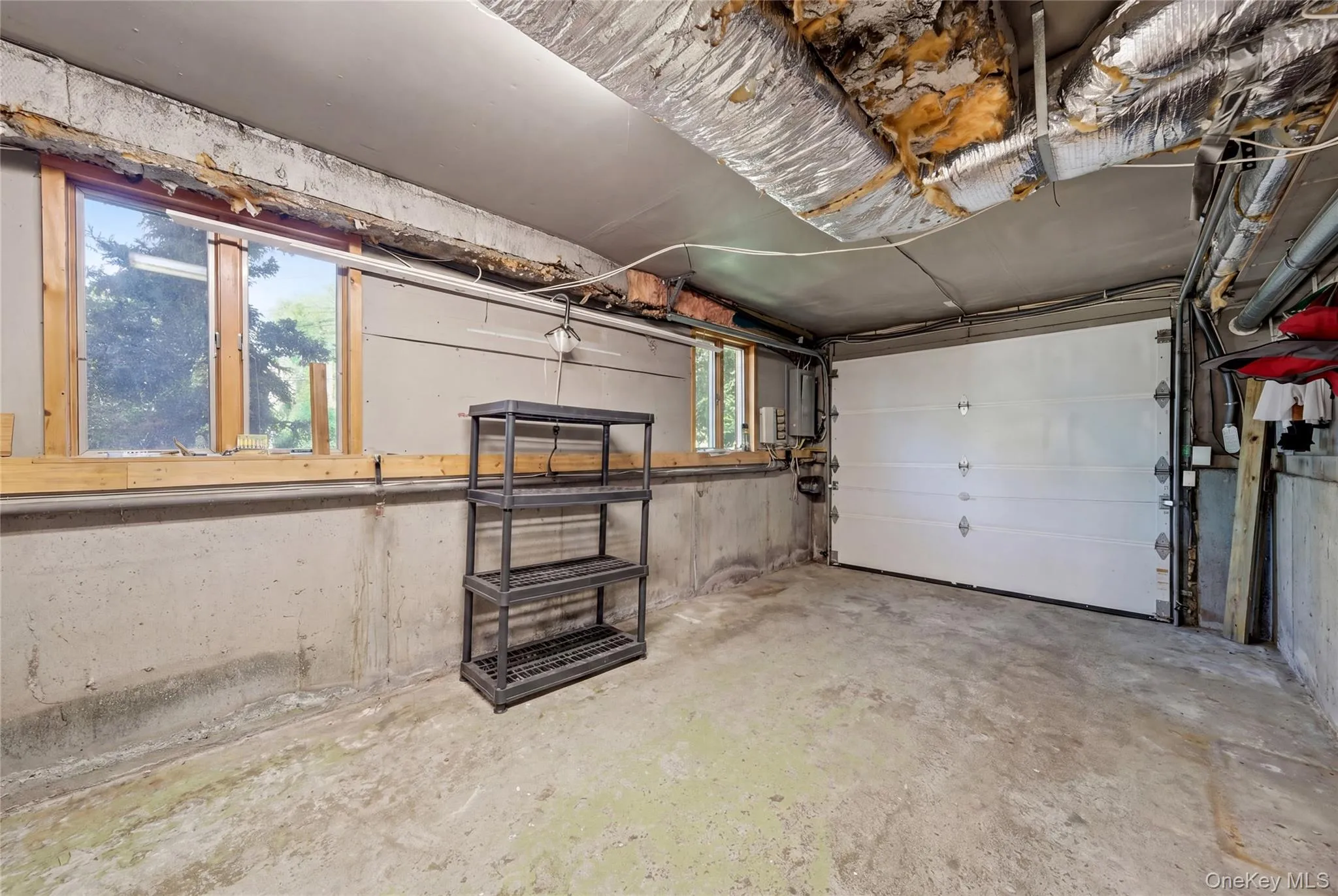 Lower Level - 1 Car Attached Garage with interior access Lower Level - 1 Car Attached Garage with interior access